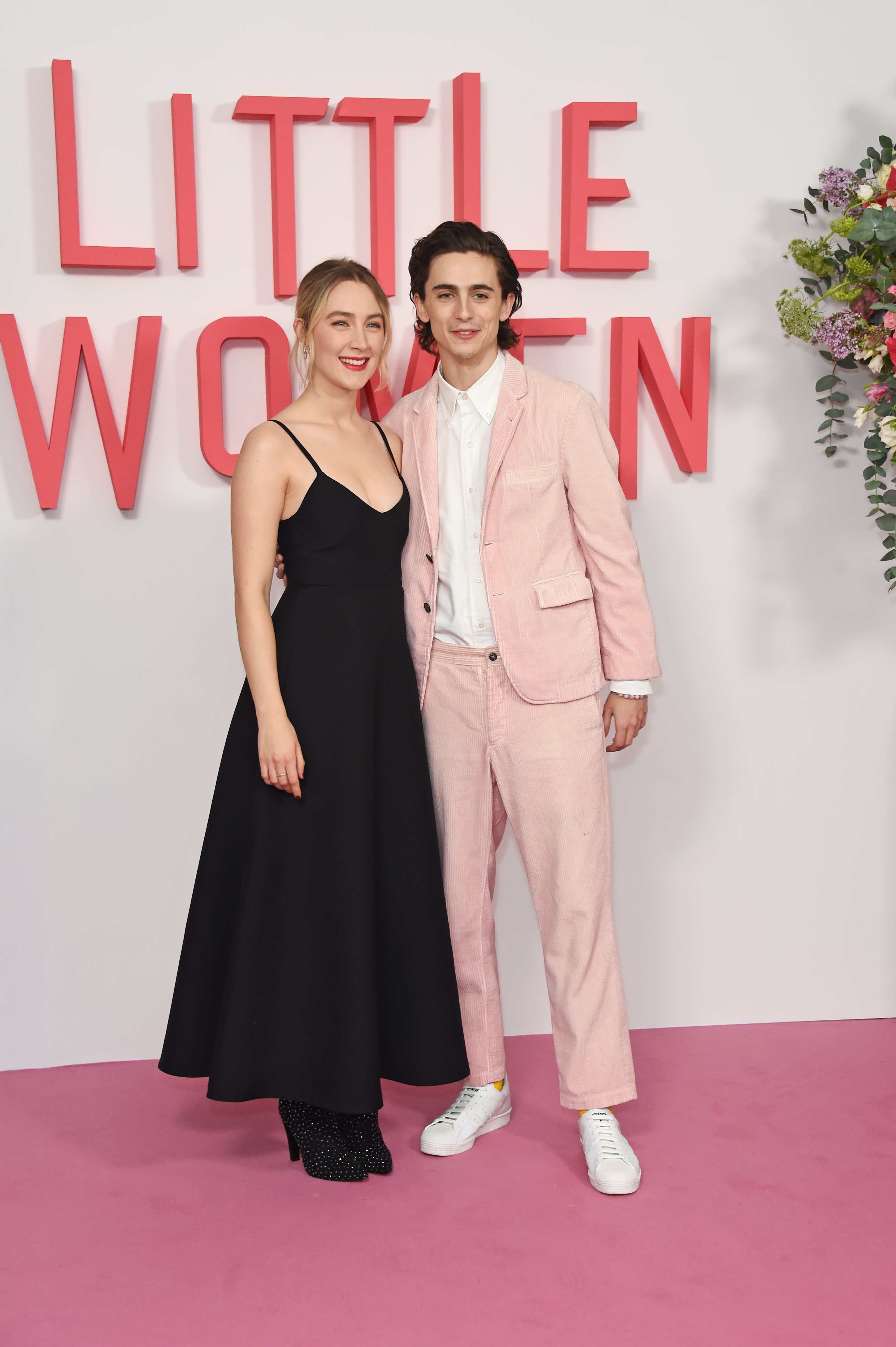 Saoirse Ronan and Timothée Chalamet posed for for "Little Women" photocall at The Soho Hotel London on December 16, 2019, in London, England. | Source: Getty Images