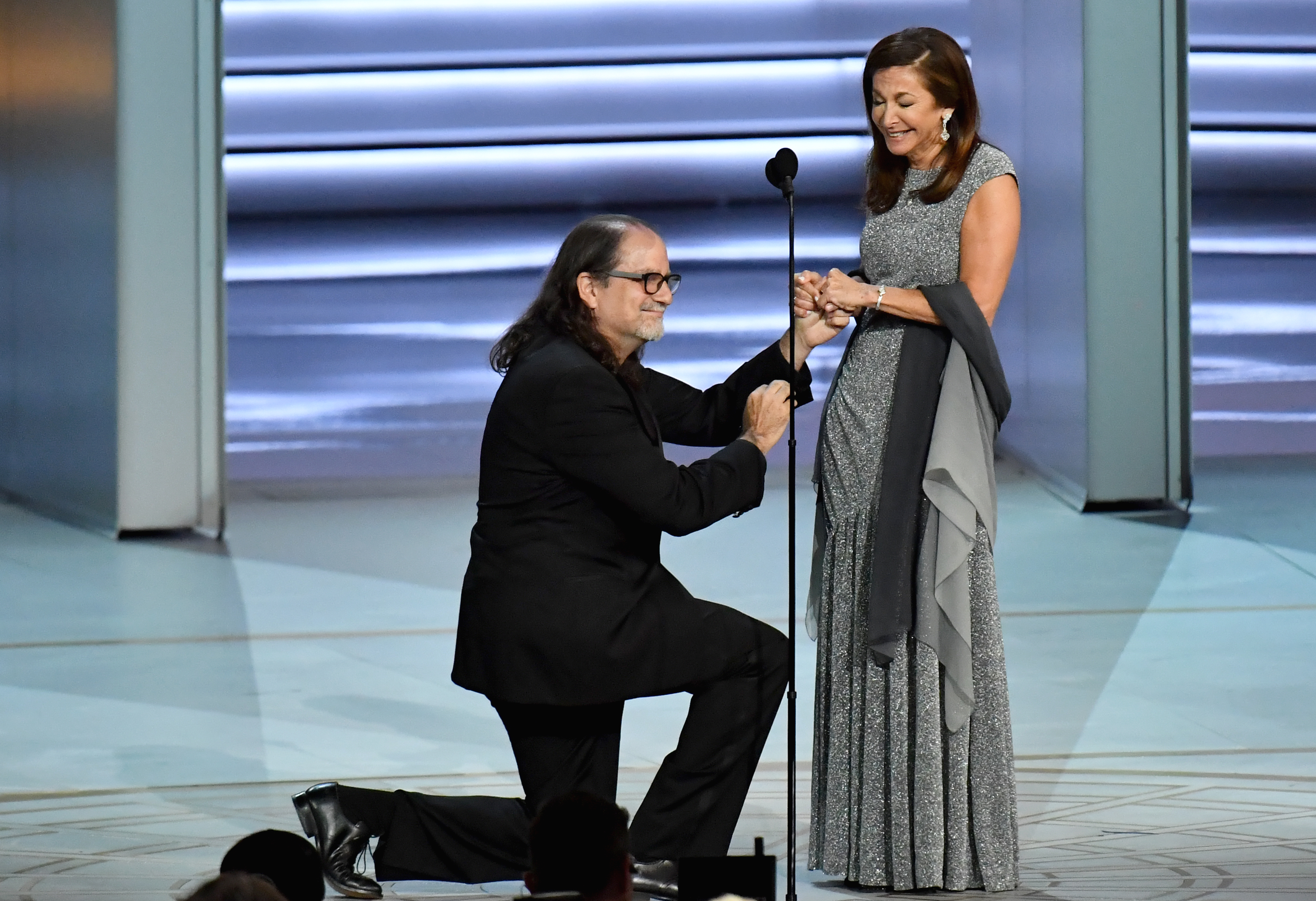 Glenn Weiss proposing to Jan Svendsen onstage during the 70th Emmy Awards at Microsoft Theater on September 17, 2018, in Los Angeles, California. | Source: Getty Images