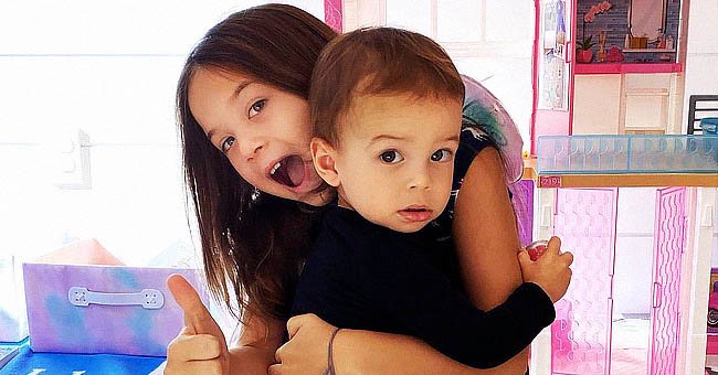 Jenna Dewan's daughter, Everly, holding Dewan's son, Callum, on a photo posted on her Instagram page | Photo: Instagram @jennadewan