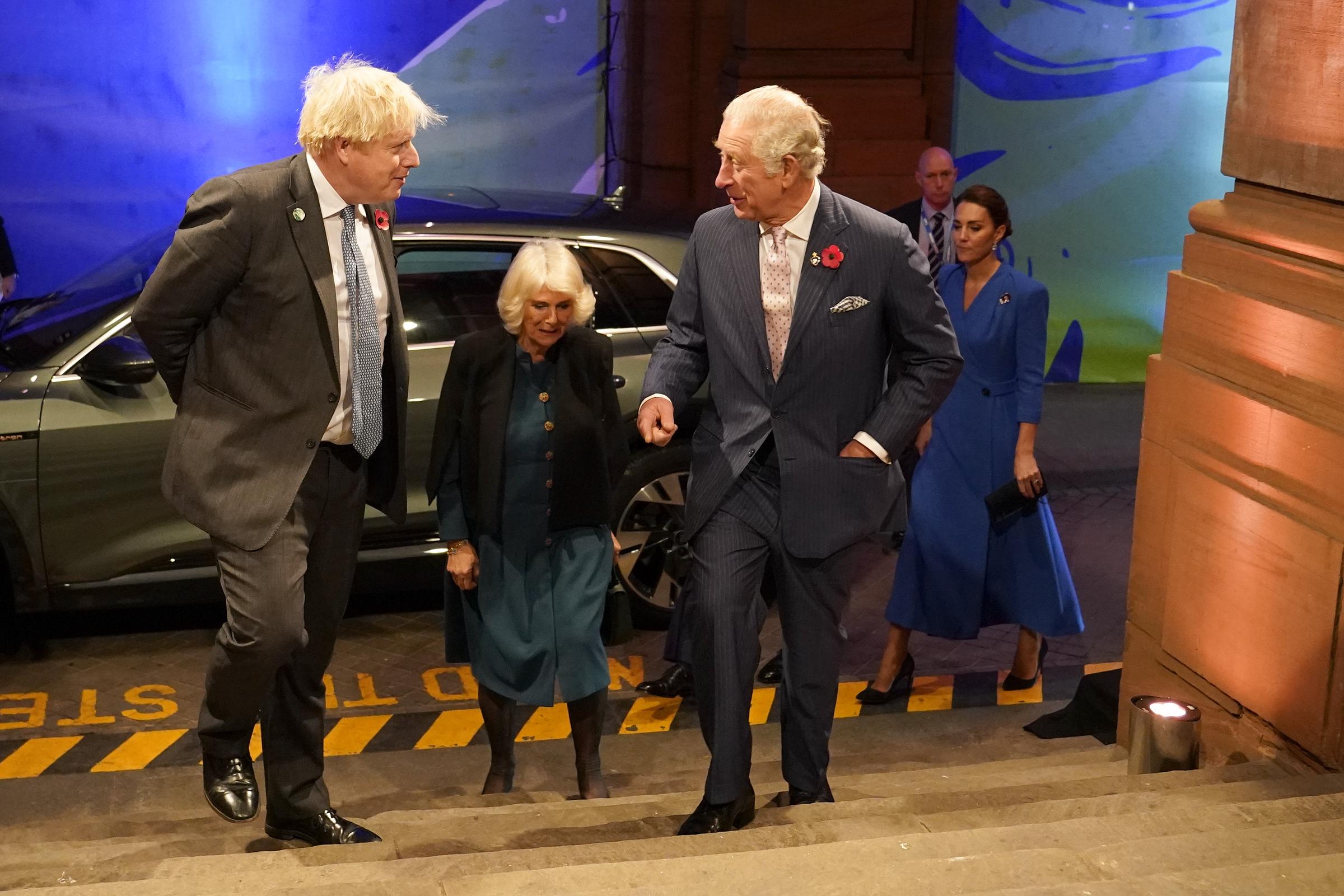 Boris Johnson, Camilla, then-Duchess of Cornwall, and Charles, then-Prince of Wales, arrive at the Scottish Event Campus (SEC) in Glasgow, United Kingdom on November 1, 2021 | Source: Getty Images