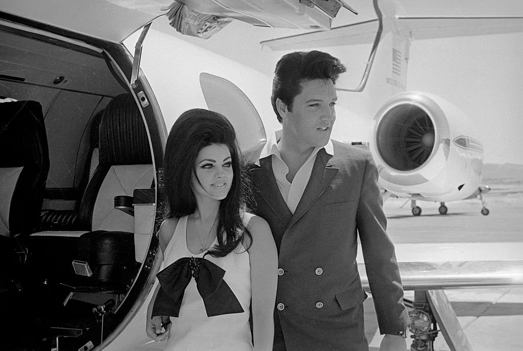 Newlyweds Elvis and Priscilla Presley prepare to board their private jet following their wedding at the Aladdin Resort and Casino in Las Vegas. | Source: Getty Images