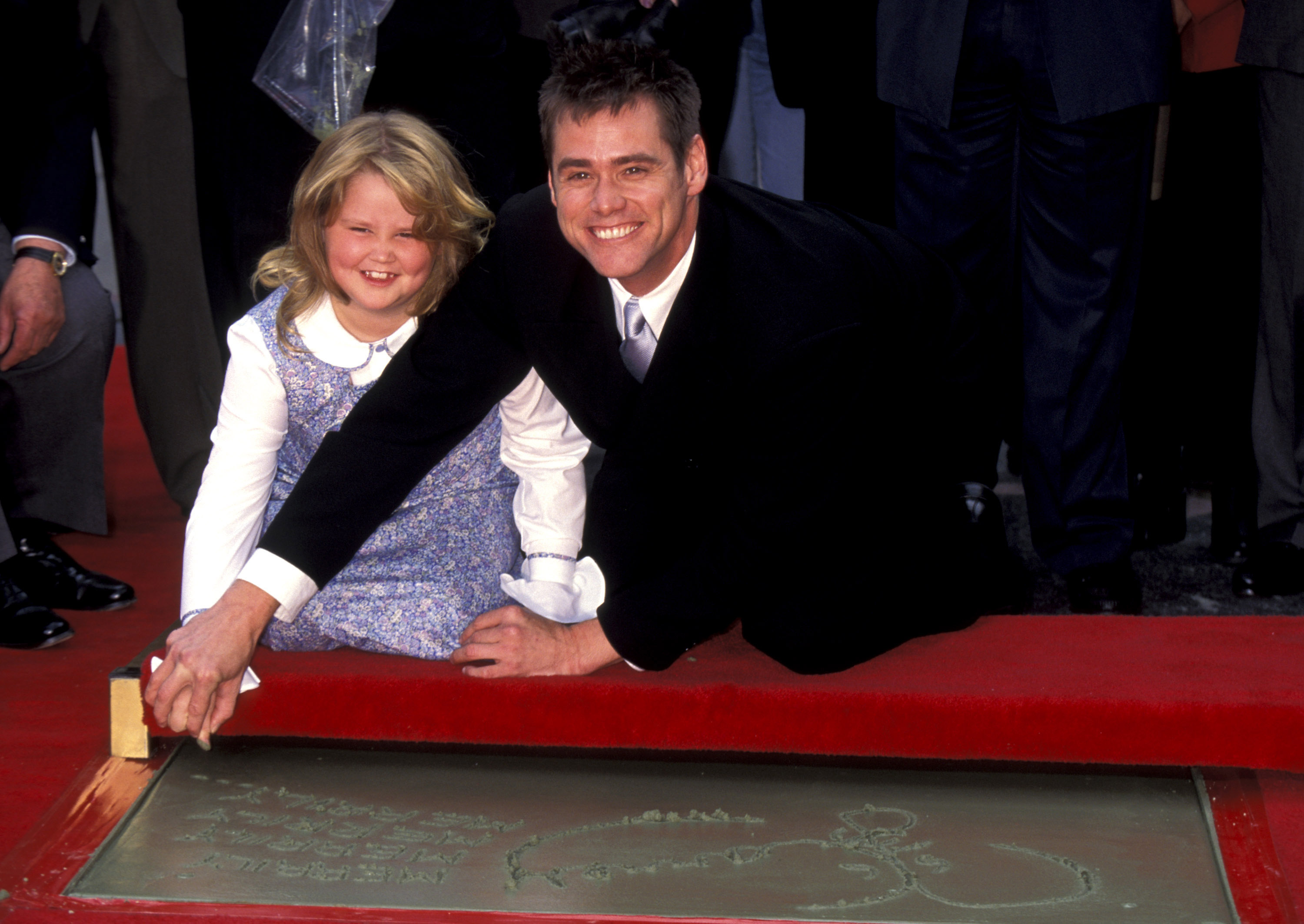 Jane and Jim Carrey at his footprint ceremony in Hollywood, California on November 2, 1995 | Source: Getty Images