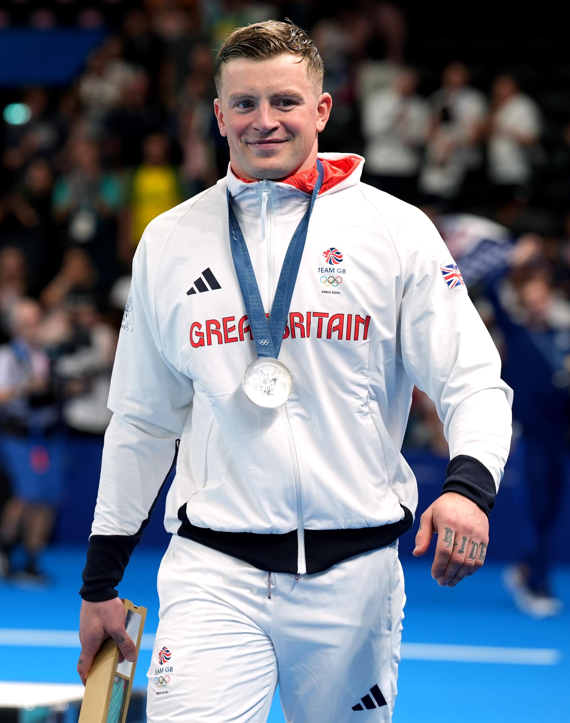 Adam Peaty with his silver medal following the Men's 100m Breaststroke Final at the 2024 Paris Olympic Games on July 28, 2024, in Paris, France. | Source: Getty Images