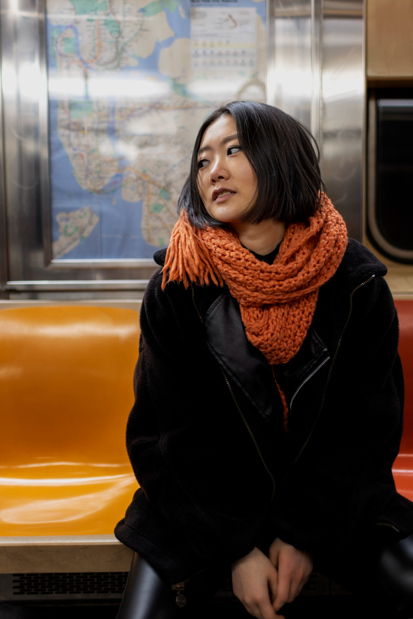 An embarrassed woman on the subway | Source: Freepik