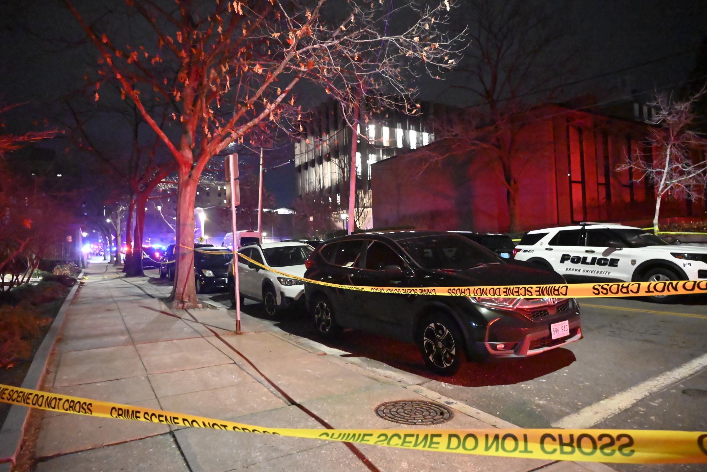 Emergency personnel work the scene, block off several buildings and establish a crime scene security cordon at Brown University on December 13, 2025, in Providence, Rhode Island | Source: Getty Images