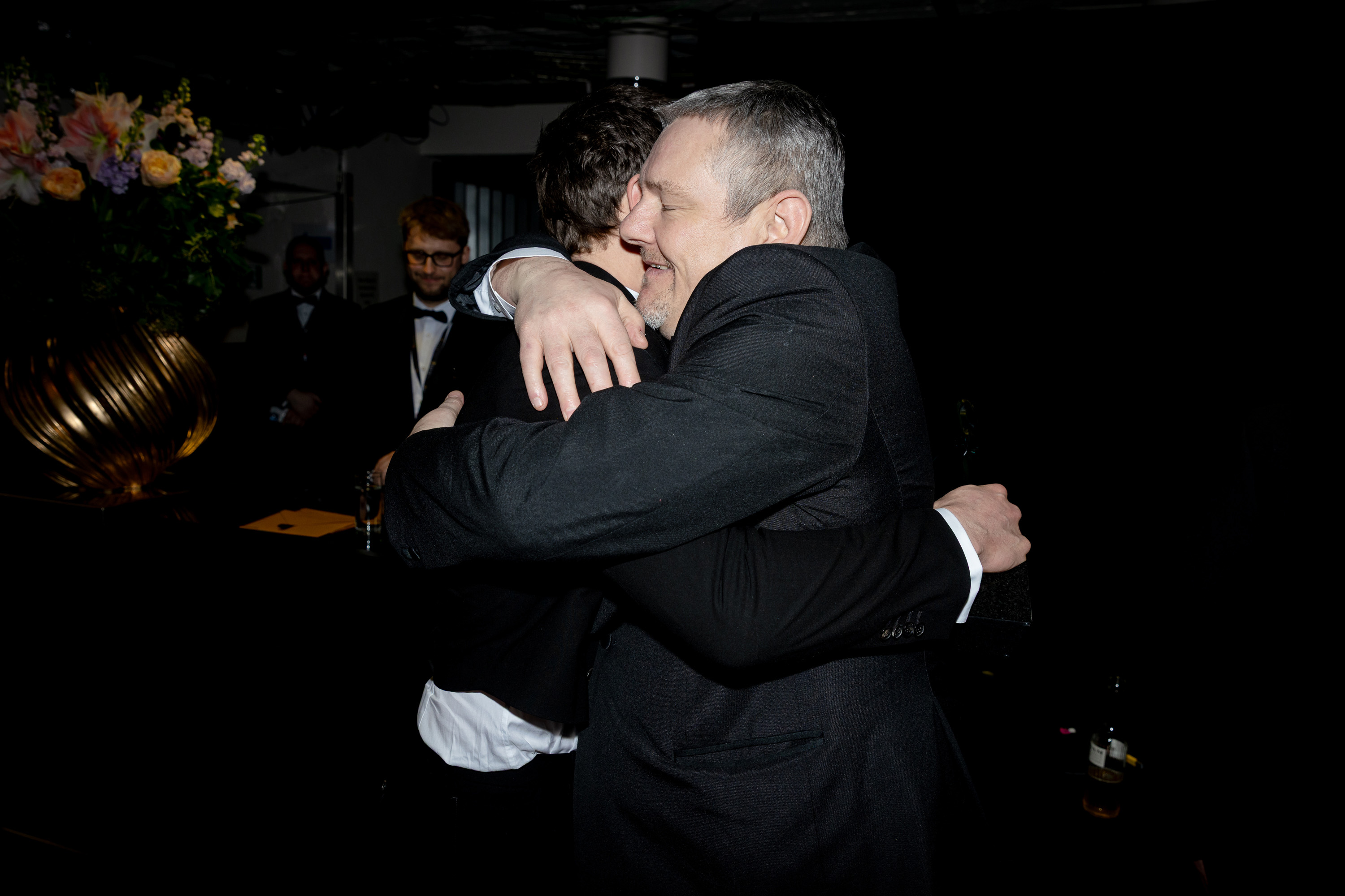 Robert Aramayo and John Davidson backstage during the EE BAFTA Awards on February 22, 2026, in London, England. | Source: Getty Images