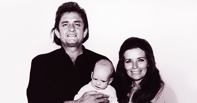 Johnny Cash and June Carter's portrait with their son. | Source: Getty Images