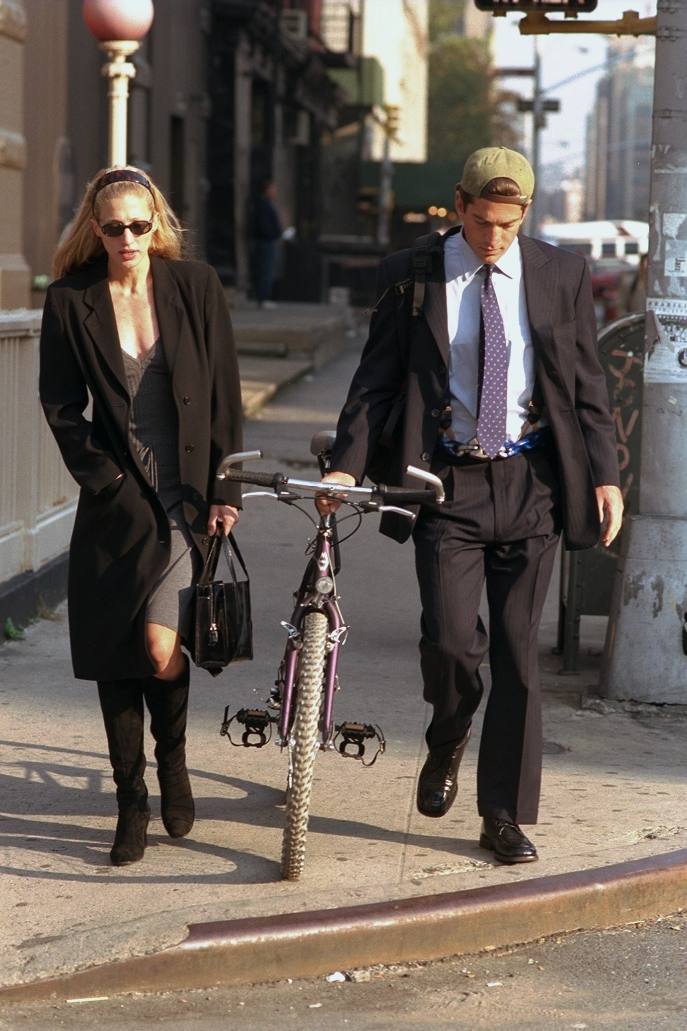 Carolyn Bessette and John F. Kennedy Jr. spotted on a walk in 1996. | Source: Getty Images