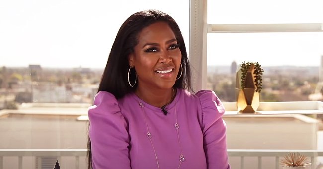 Kenya Moore Flaunts Her Glamorous Pink Look While Riding a Bentley (Photo)
