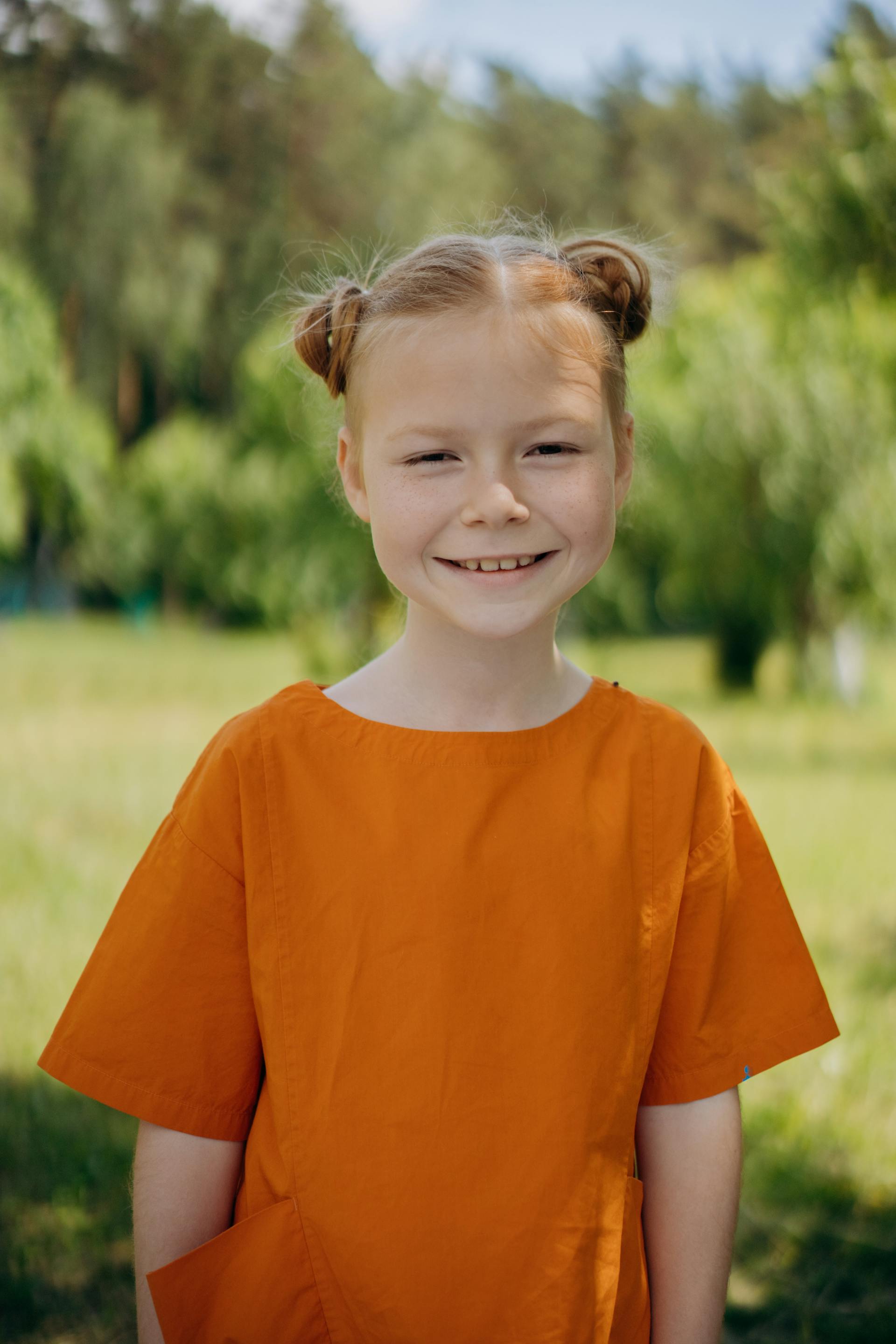 Una niña sonriendo | Fuente: Pexels