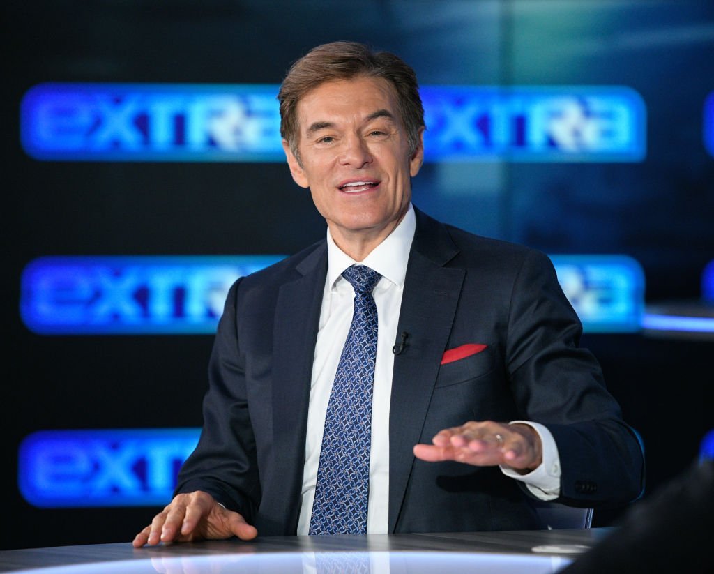 Dr. Mehmet Oz visits "Extra" at Burbank Studios | Getty Images