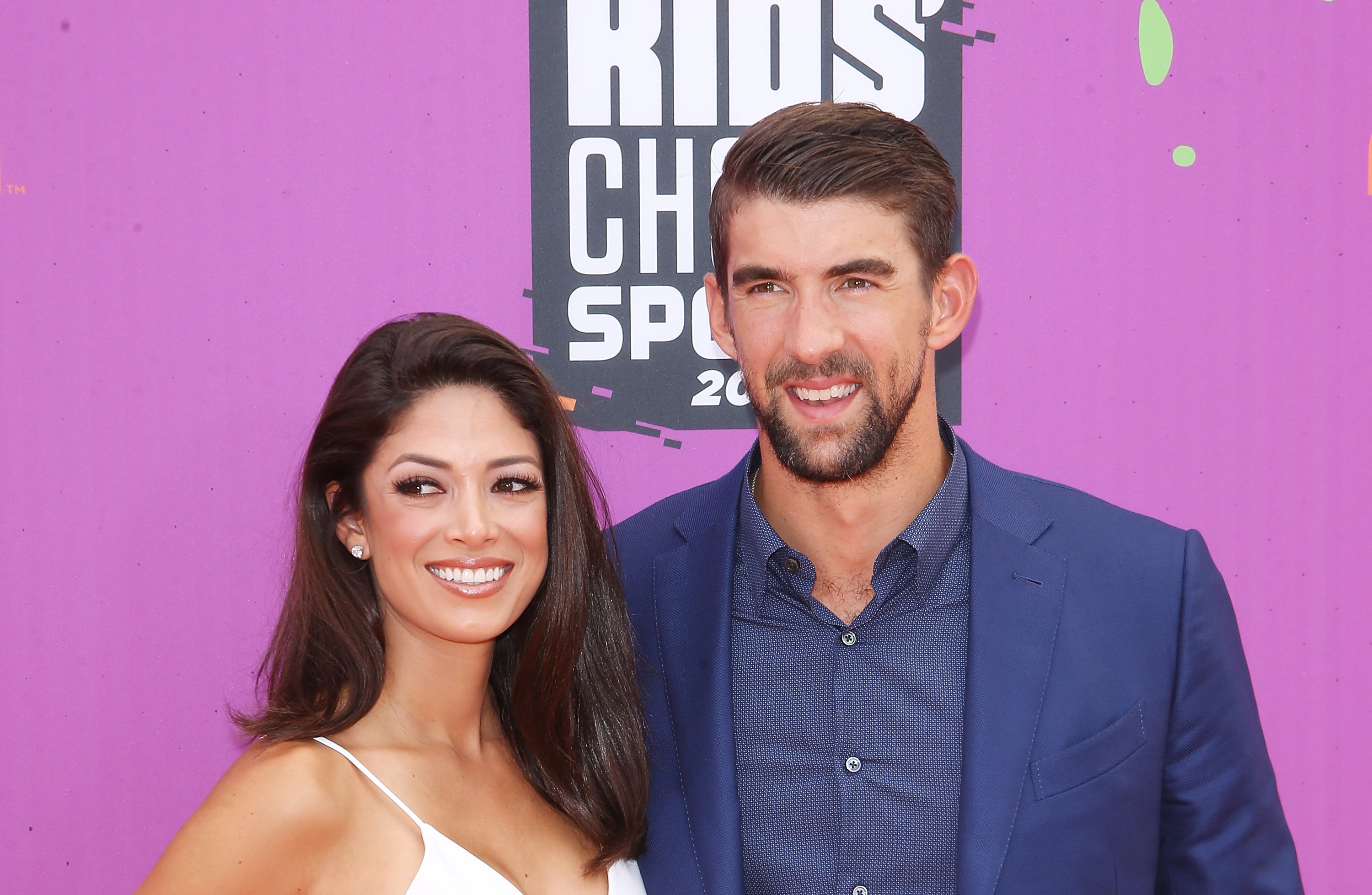 Nicole Johnson and Michael Phelps arrive at Nickelodeon Kids' Choice Sports Awards 2017 on July 13, 2017 in Los Angeles, California. | Source: Getty Images