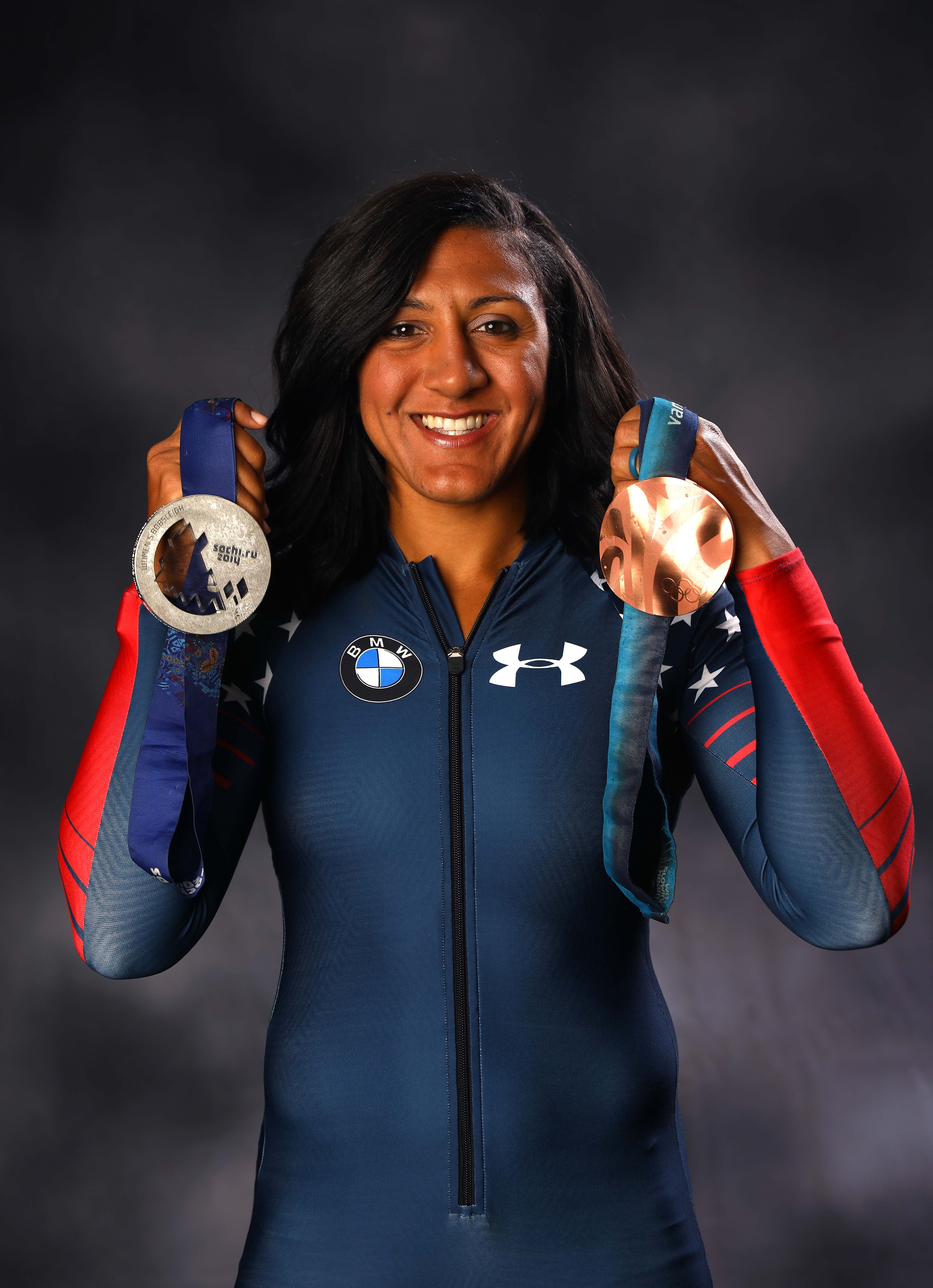 Elana Meyers Taylor poses with her Olympic medals ahead of the PyeongChang 2018 Winter Games in Park City, Utah, on September 25, 2017. | Source: Getty Images