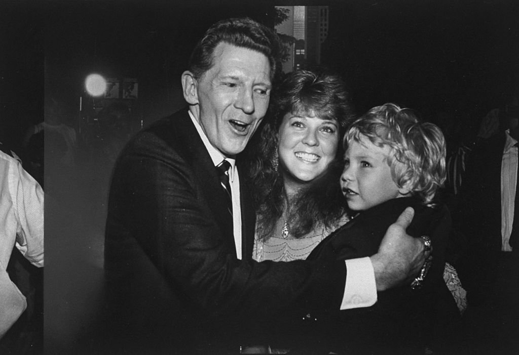 Musician Jerry Lee Lewis with 6th wife Kerrie and their son Jerry Lee III at opening of film about his life Great Balls of Fire. | Source: Getty Images