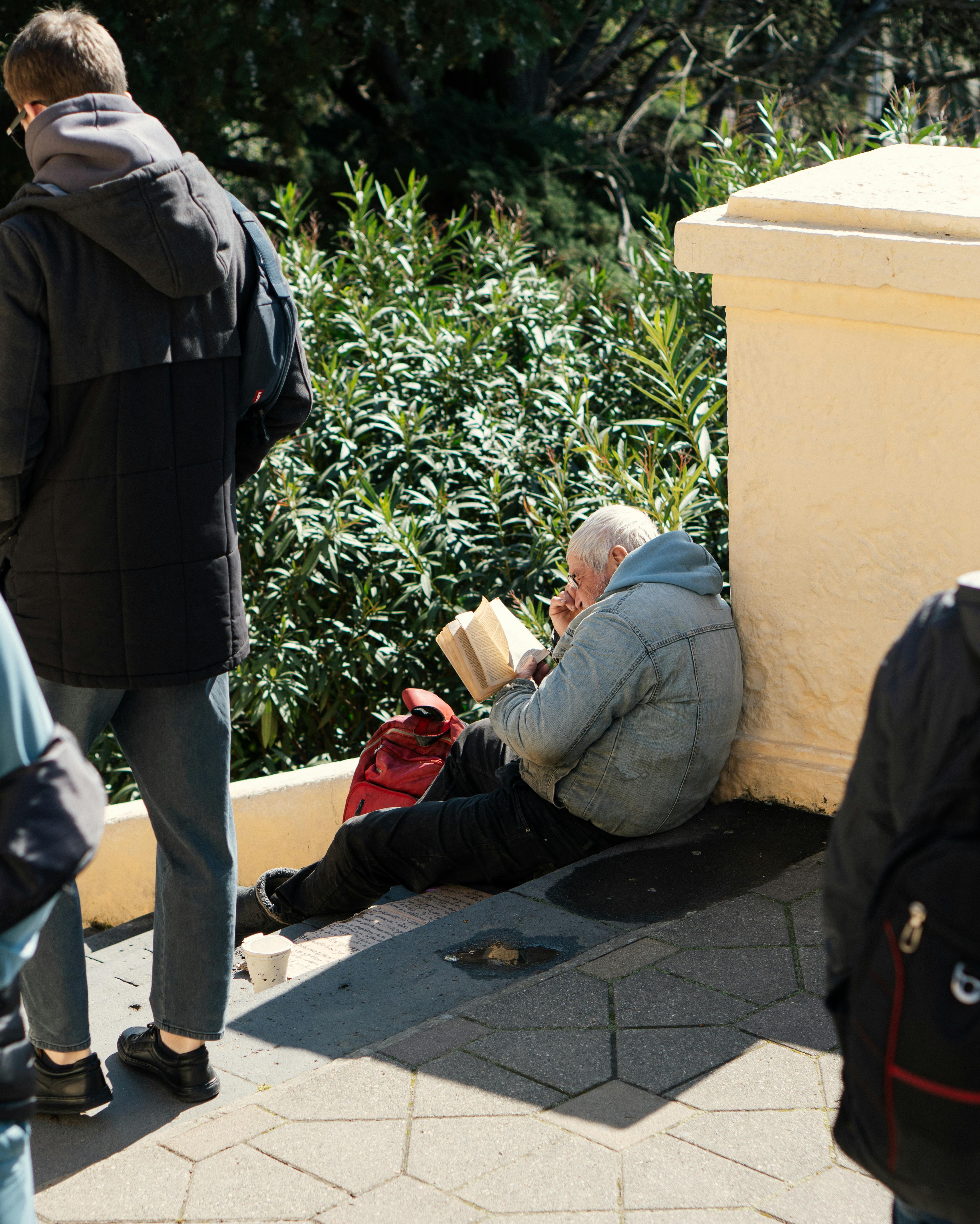 John finding a space to read on his college campus | Source: Pexels