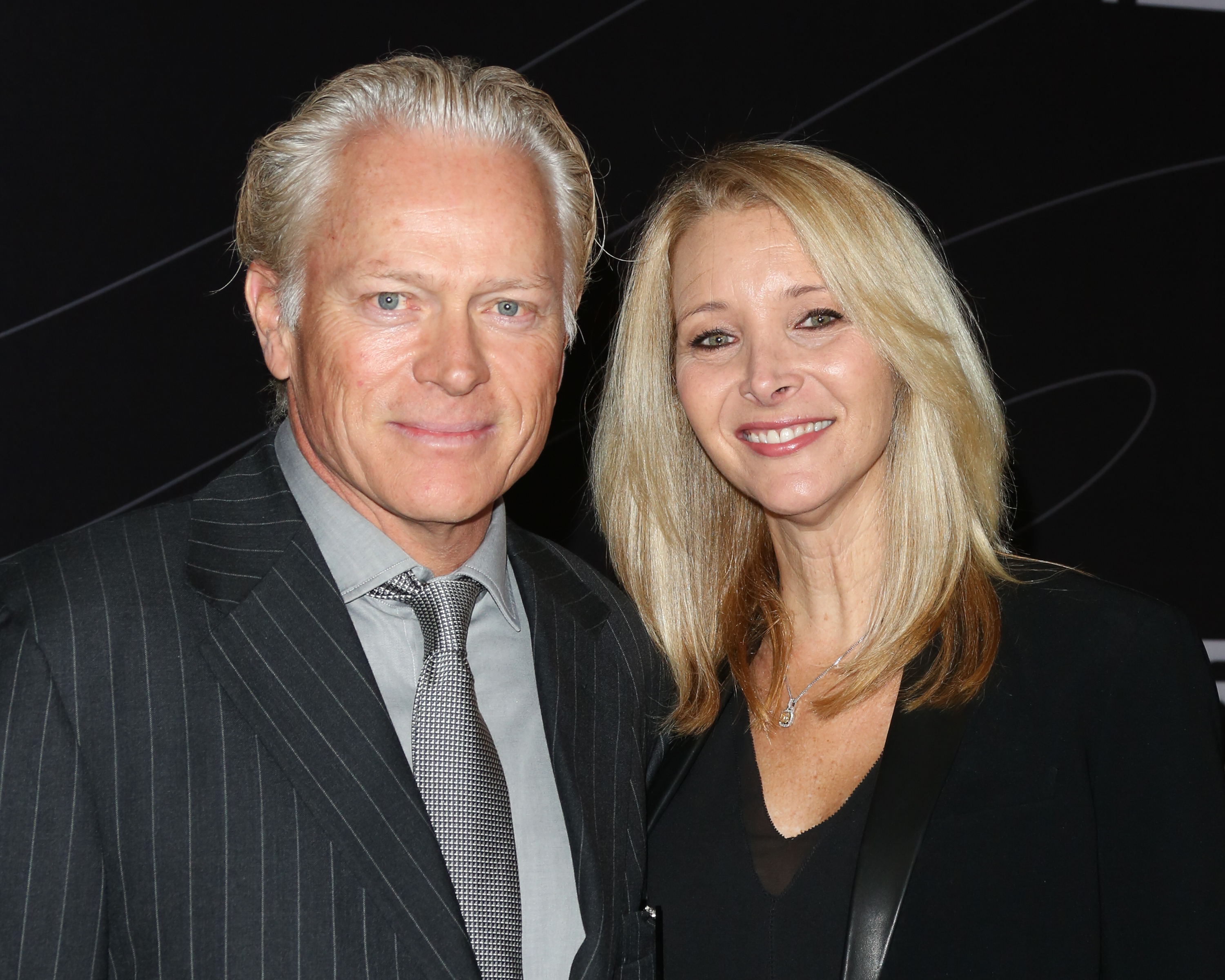Michel Stern and Lisa Kudrow attend the Petersen Automotive Museum grand re-opening gala on December 5, 2015 | Source: Getty Images
