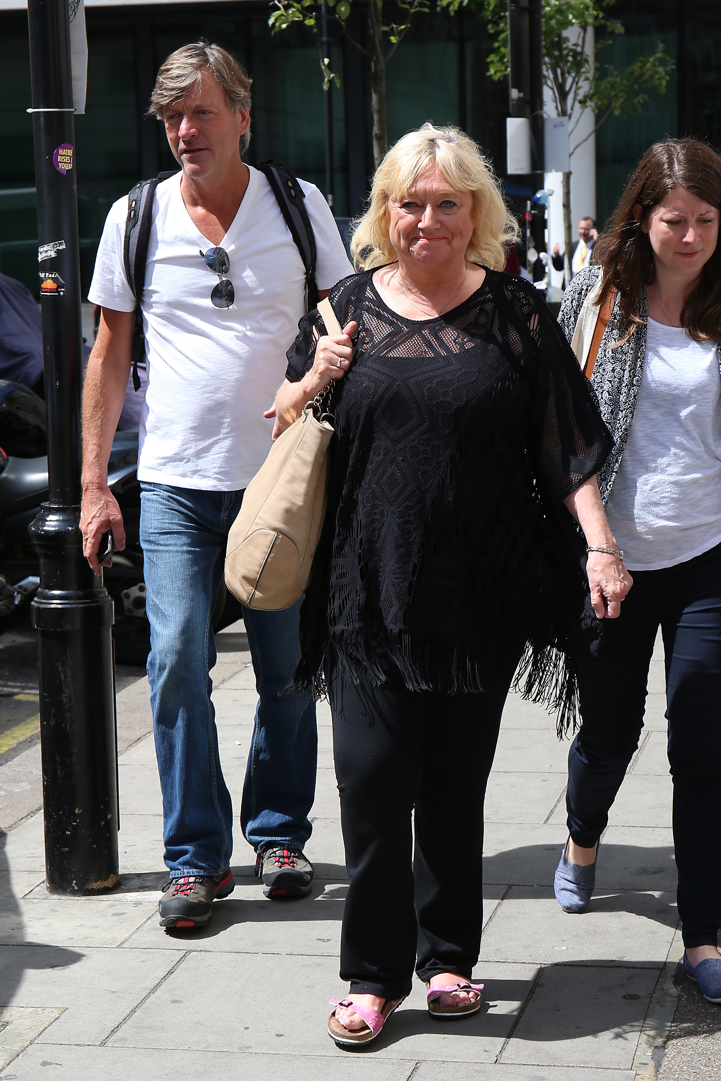 Judy Finnigan and Richard Madeley are pictured arriving at BBC Radio Studios in London on 18 June 2015, stepping out together in a more understated setting as they continued to make occasional public appearances, balancing media commitments with a noticeably more low-key, private pace of life.