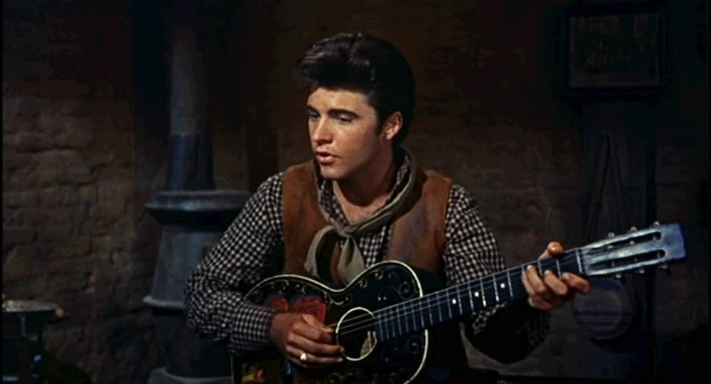 Cropped screenshot of Ricky Nelson from the trailer for the film Rio Bravo, 1959. | Photo: Wikimedia Commons Images