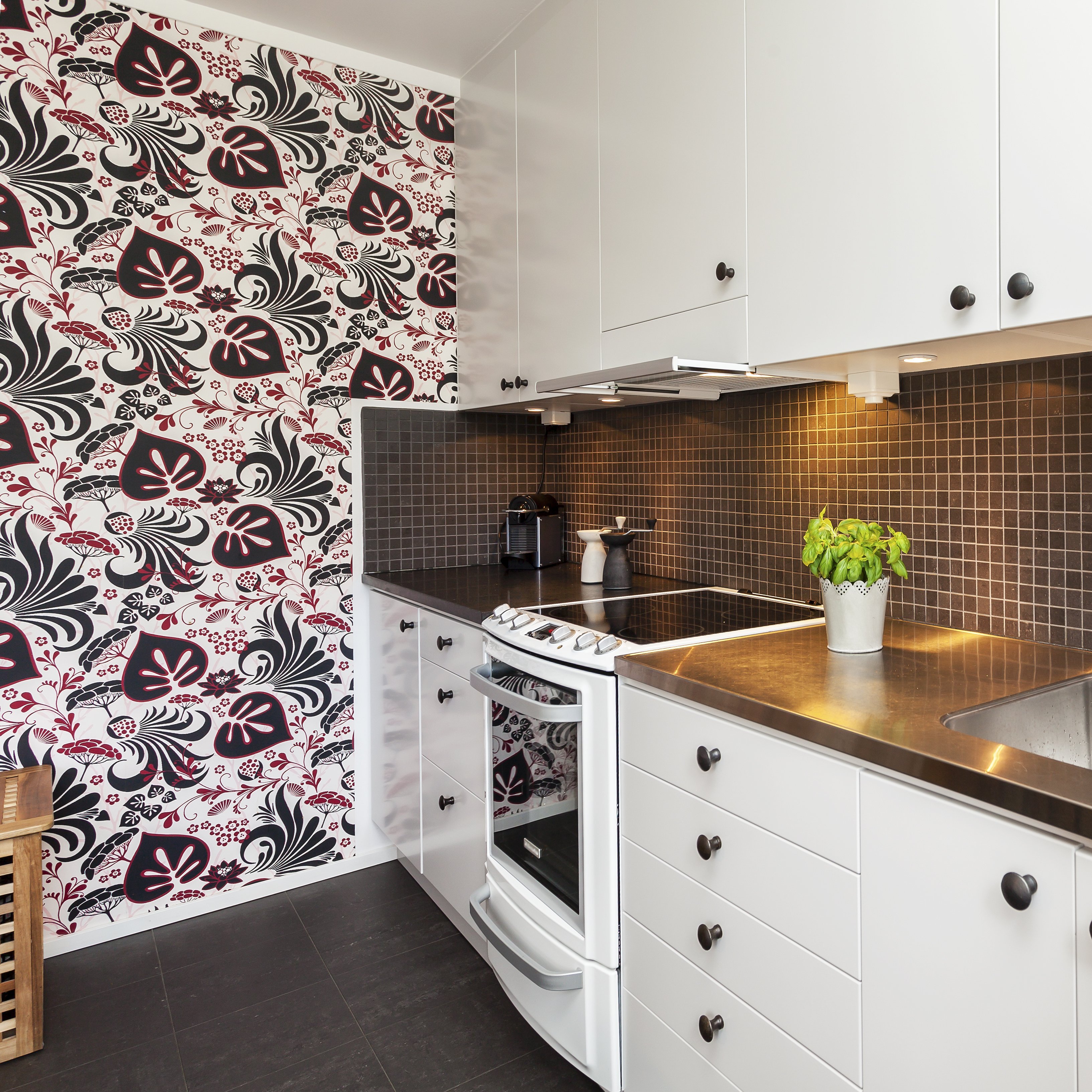 A photo of a kitchen interior with modern wallpaper. | Photo: Shutterstock