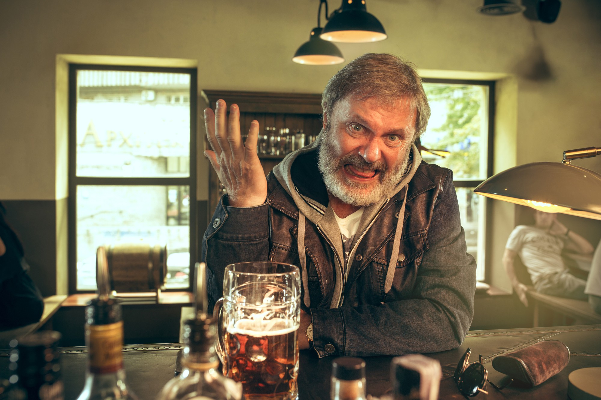 An upset man shouting at someone off-camera | Source: Freepik