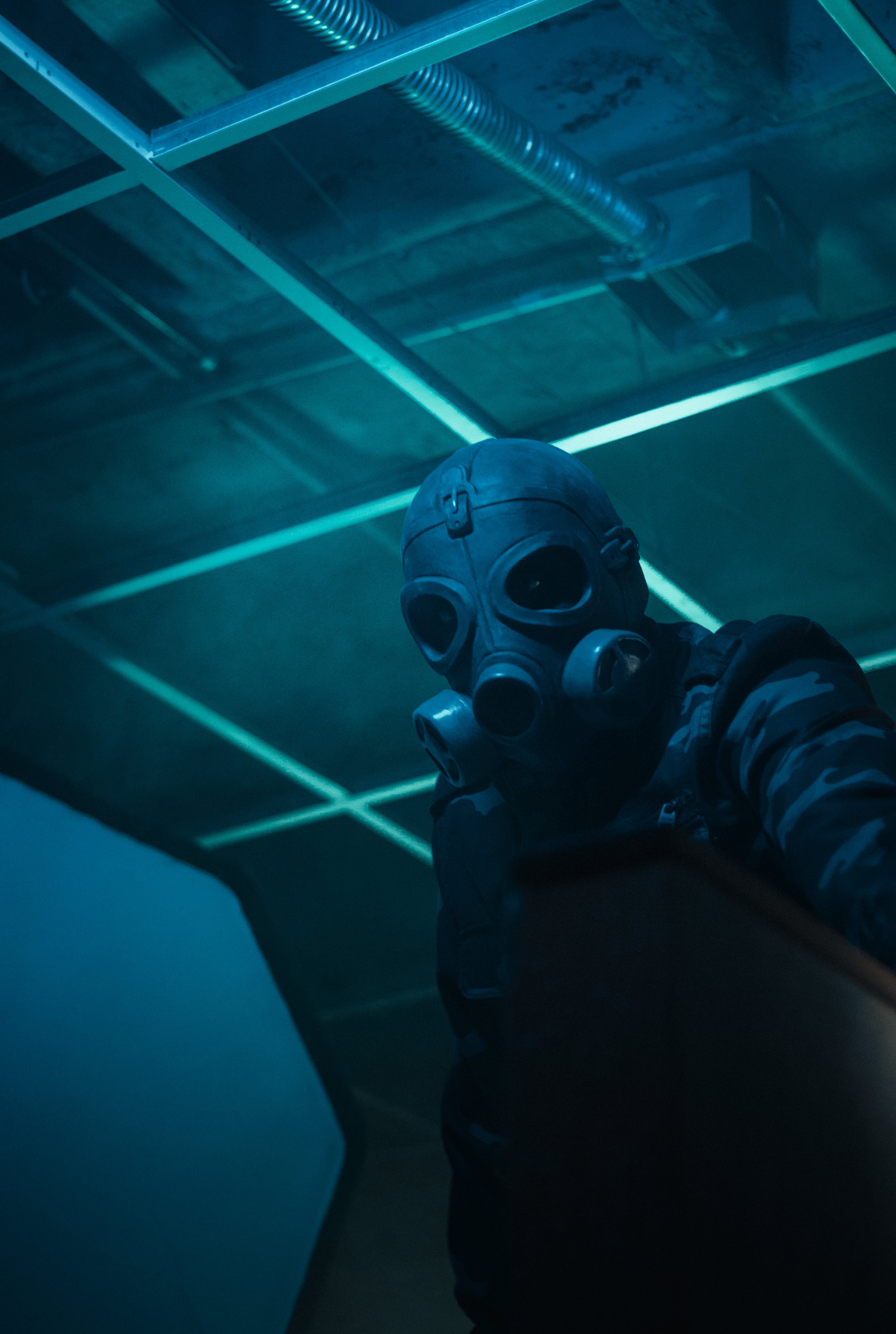 A person wearing a gas mask. | Source: Pexels