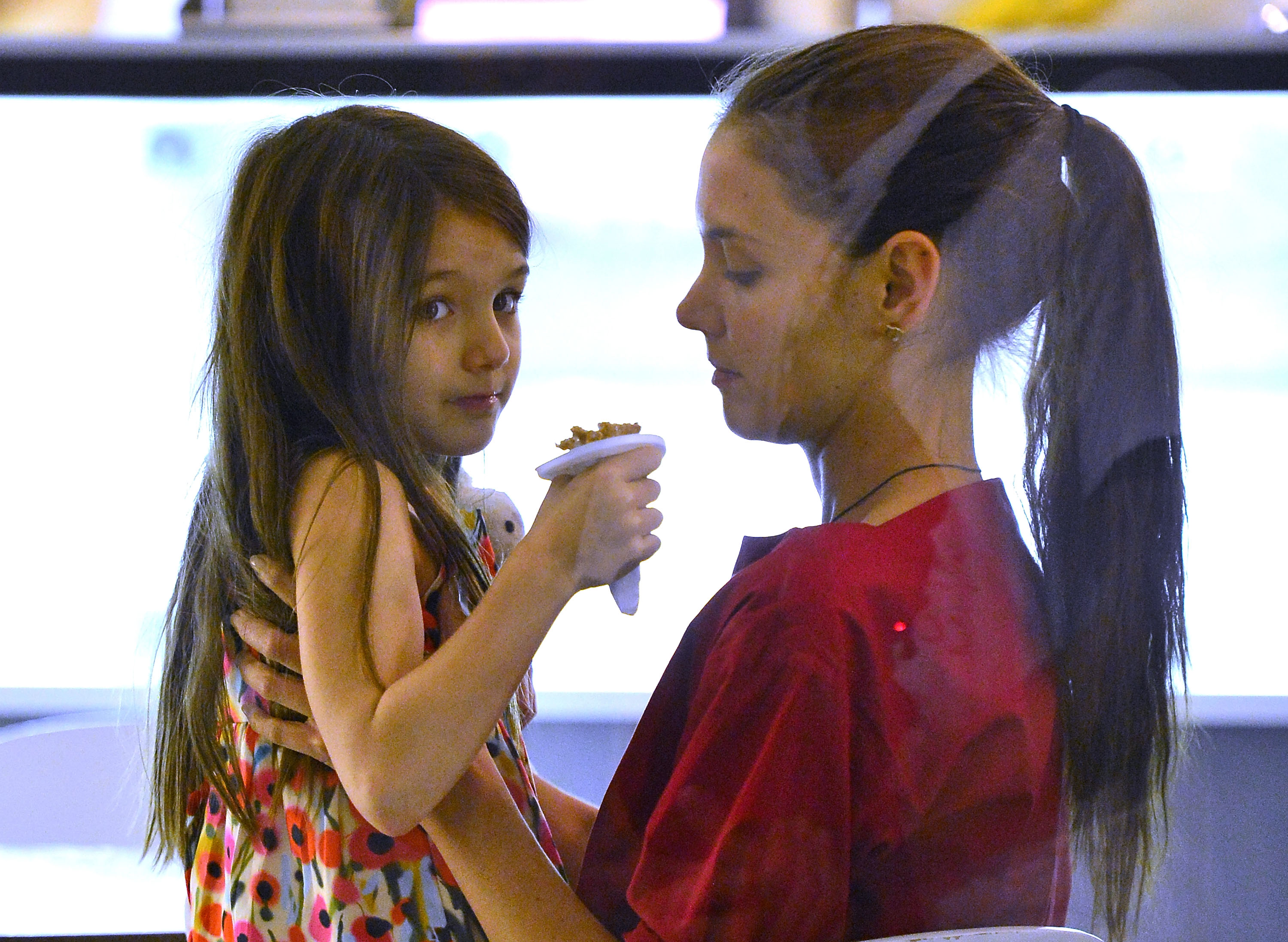 Katie Holmes and Suri Cruise spotted in the East Village on July 3, 2012. | Source: Getty Images