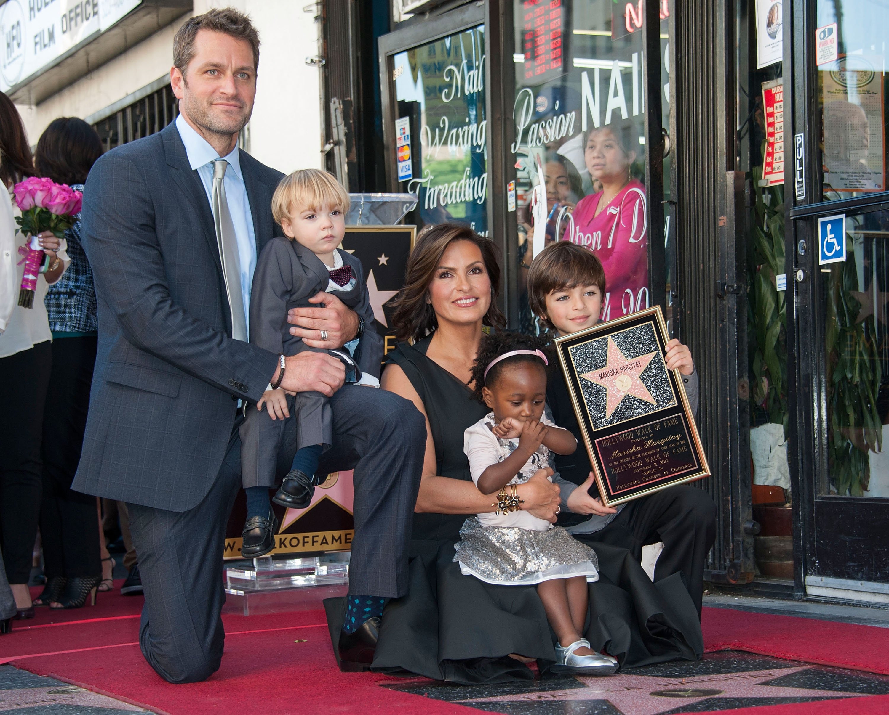 Mariska Hargitay and her family on The Hollywood Walk of Fame on November 8, 2013 in Hollywood, California | Source: Getty Images