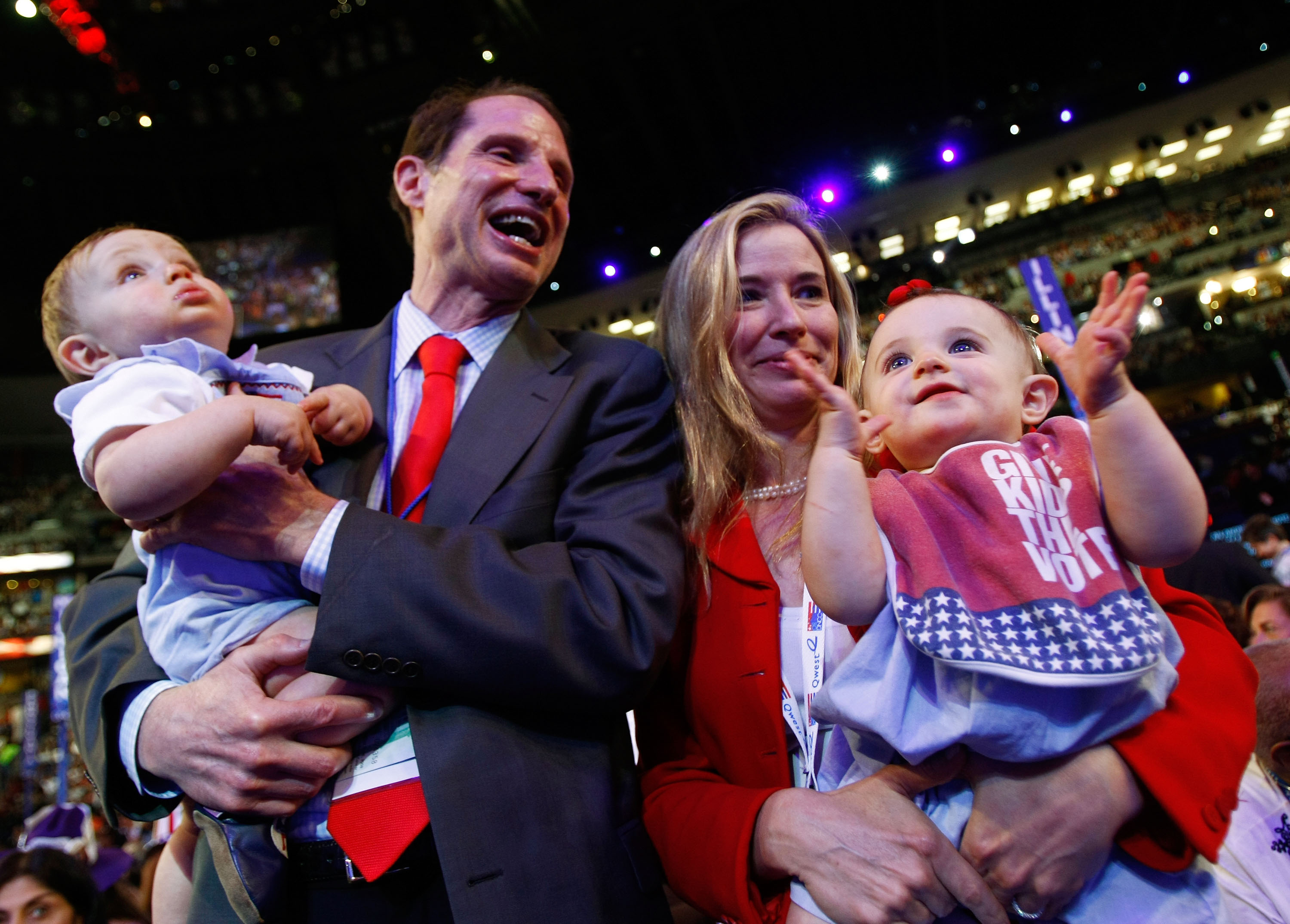 U.S. Sen. Ron Wyden (D-OR) (2nd L) and his wife Nancy (2nd R) hold their kids William (L) and Ava Rose during day two of the Democratic National Convention (DNC) at the Pepsi Center August 26, 2008, in Denver, Colorado. | Source: Getty Images