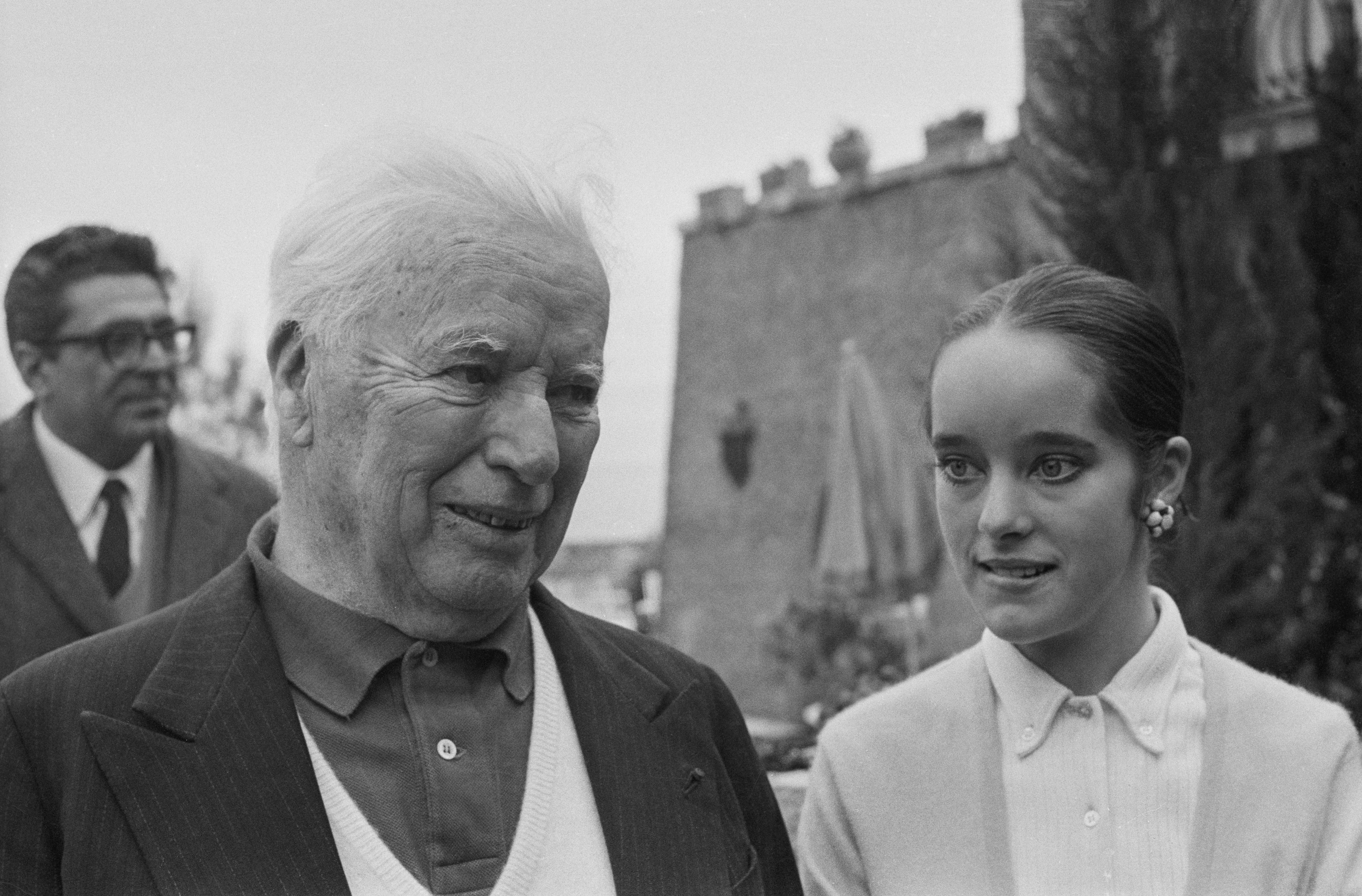 Charlie Chaplin and his daughter Victoria on vacation in Italy on April 1, 1967 | Source: Getty Images