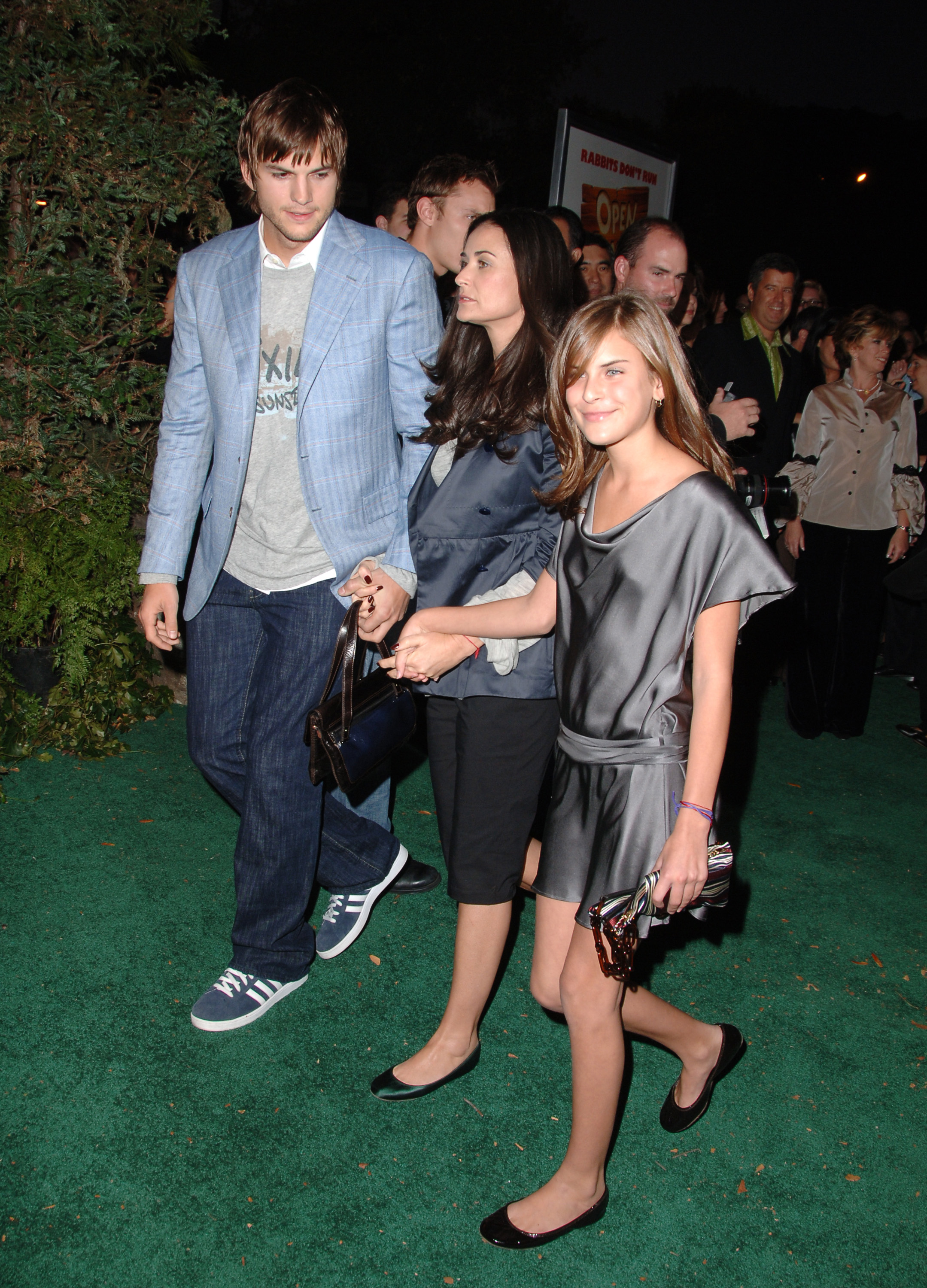 Ashton Kutcher, Demi Moore and Tallullah Willis at the "Open Season" premiere in Los Angeles, 2006 | Source: Getty images
