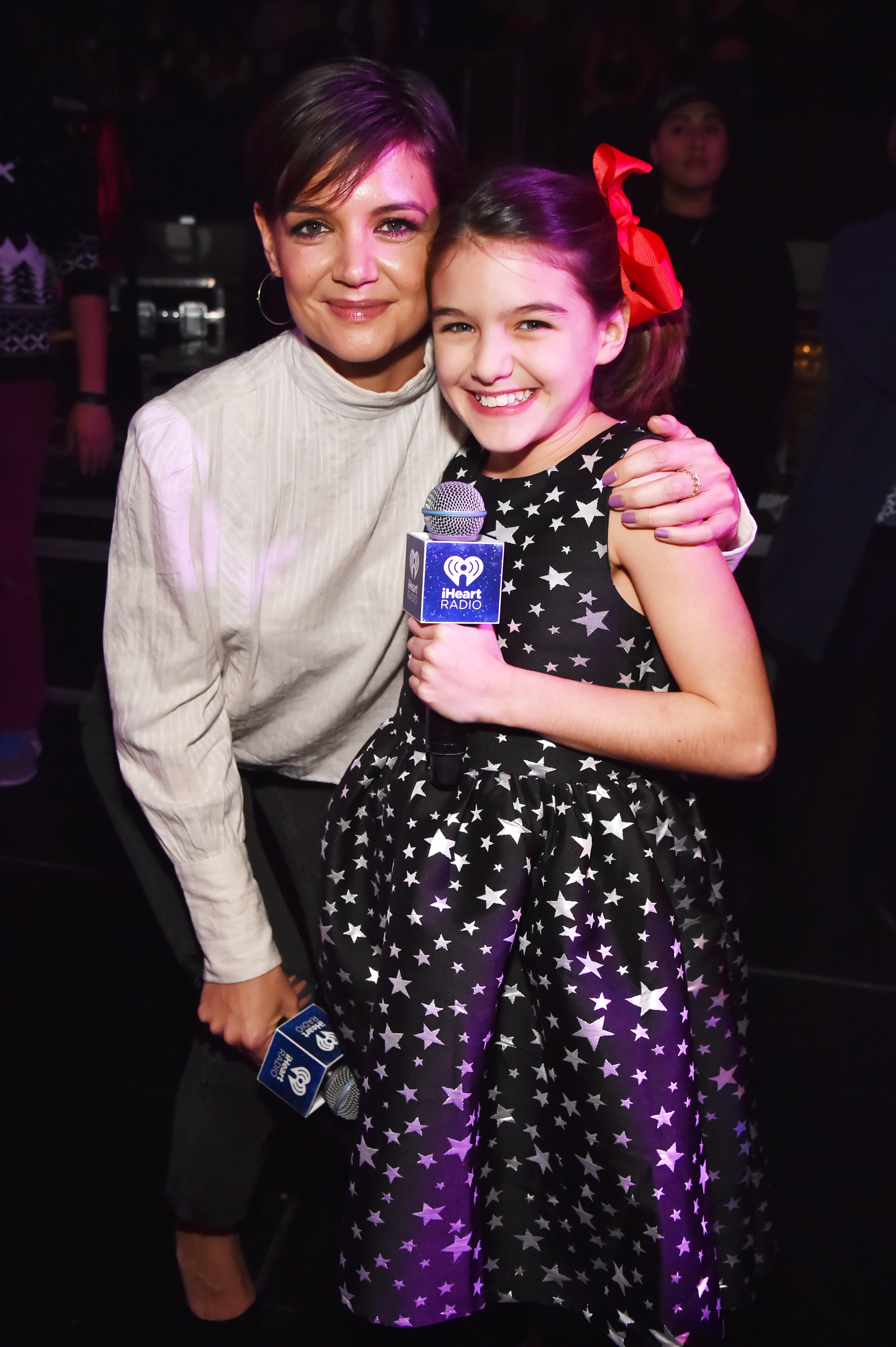 Suri Cruise and Katie Holmes at the Z100's Jingle Ball 2017 on December 8, 2017 | Source: Getty Images