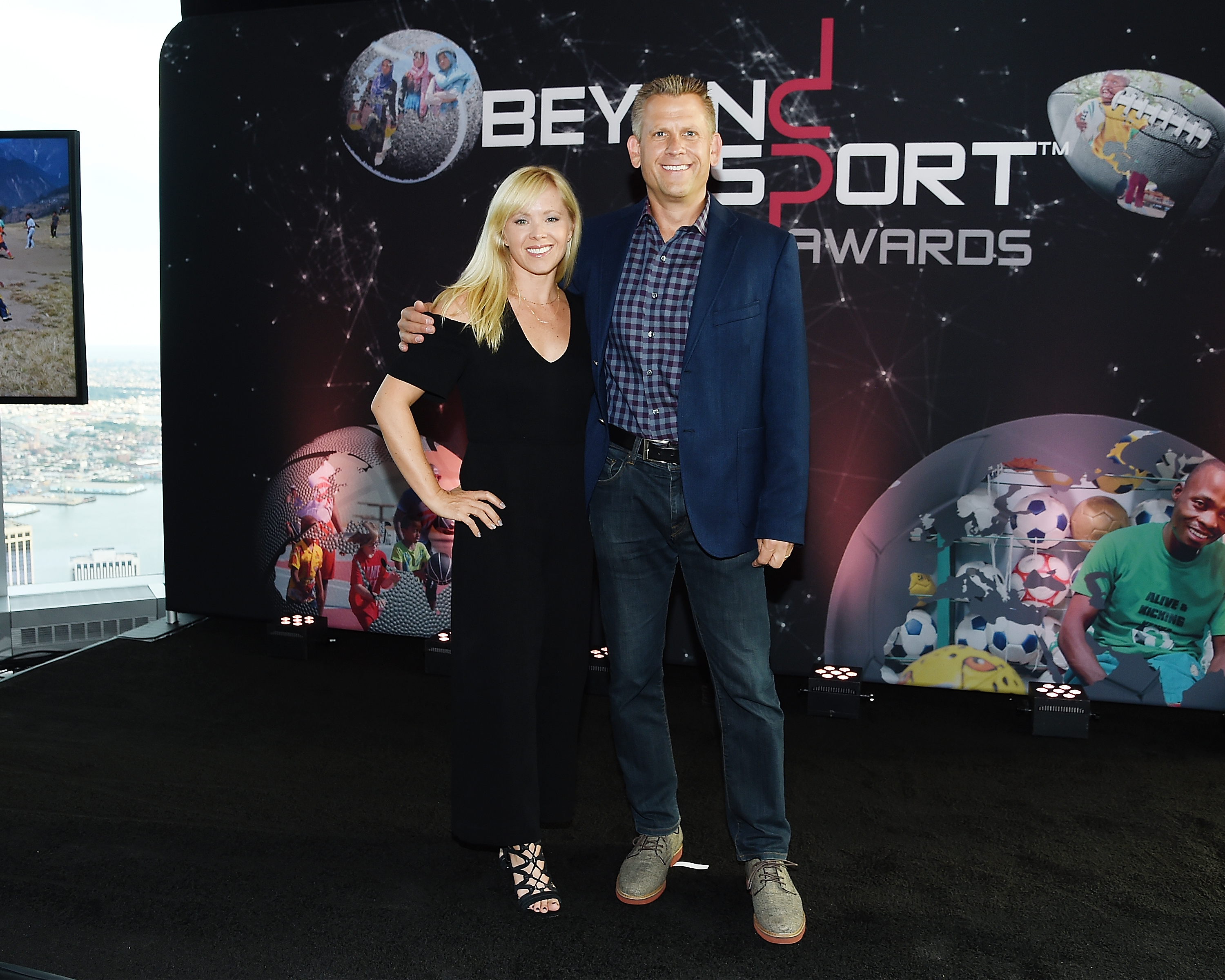 Lizzie and John Brenkus attend the Beyond Sport Global Awards on July 26, 2017, in New York City | Source: Getty Images