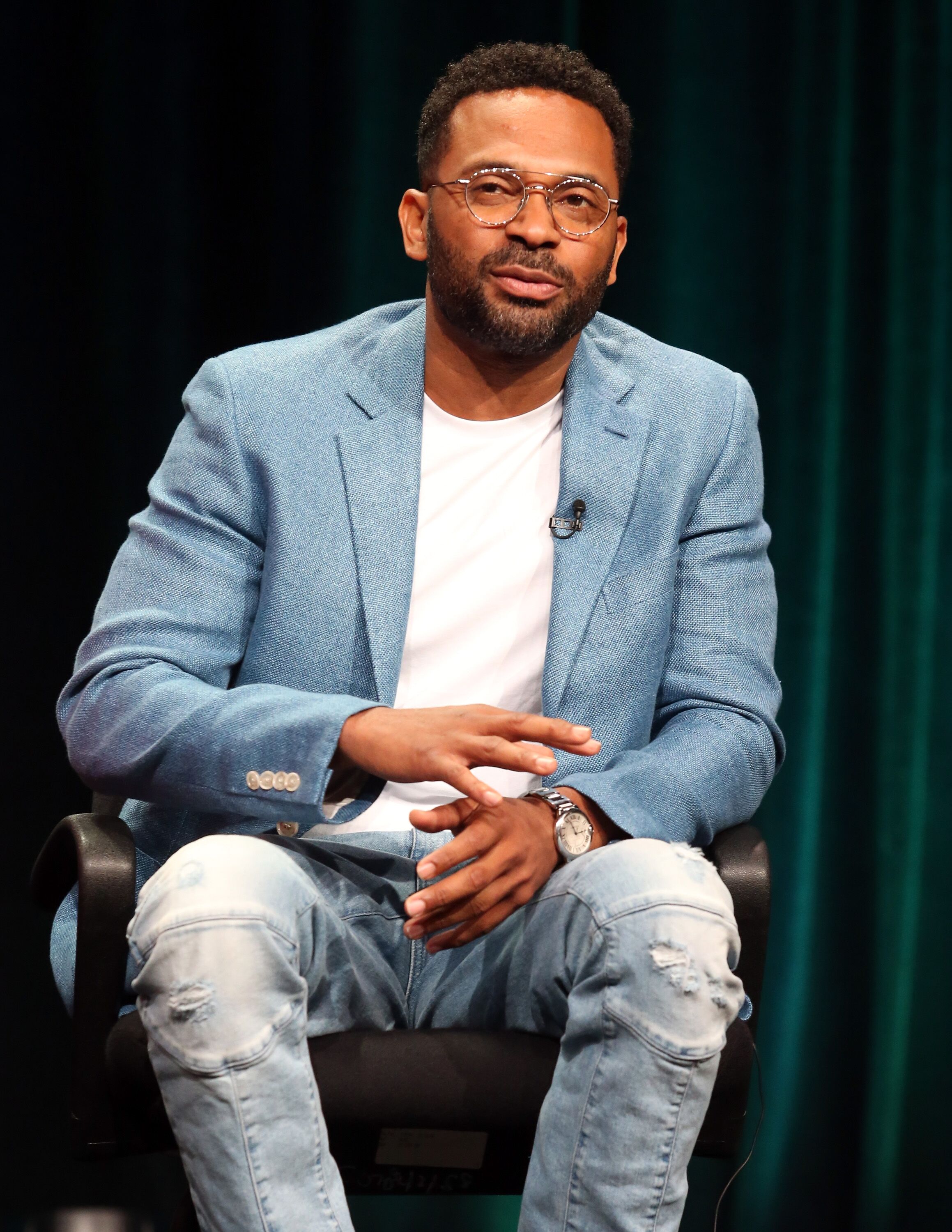 Mike Epps speaks onstage during the 'Survivor's Remorse' panel discussion at the STARZ portion of the 2015 Summer TCA Tour at The Beverly Hilton Hotel on July 31, 2015 in Beverly Hills, California. | Source: Getty Images