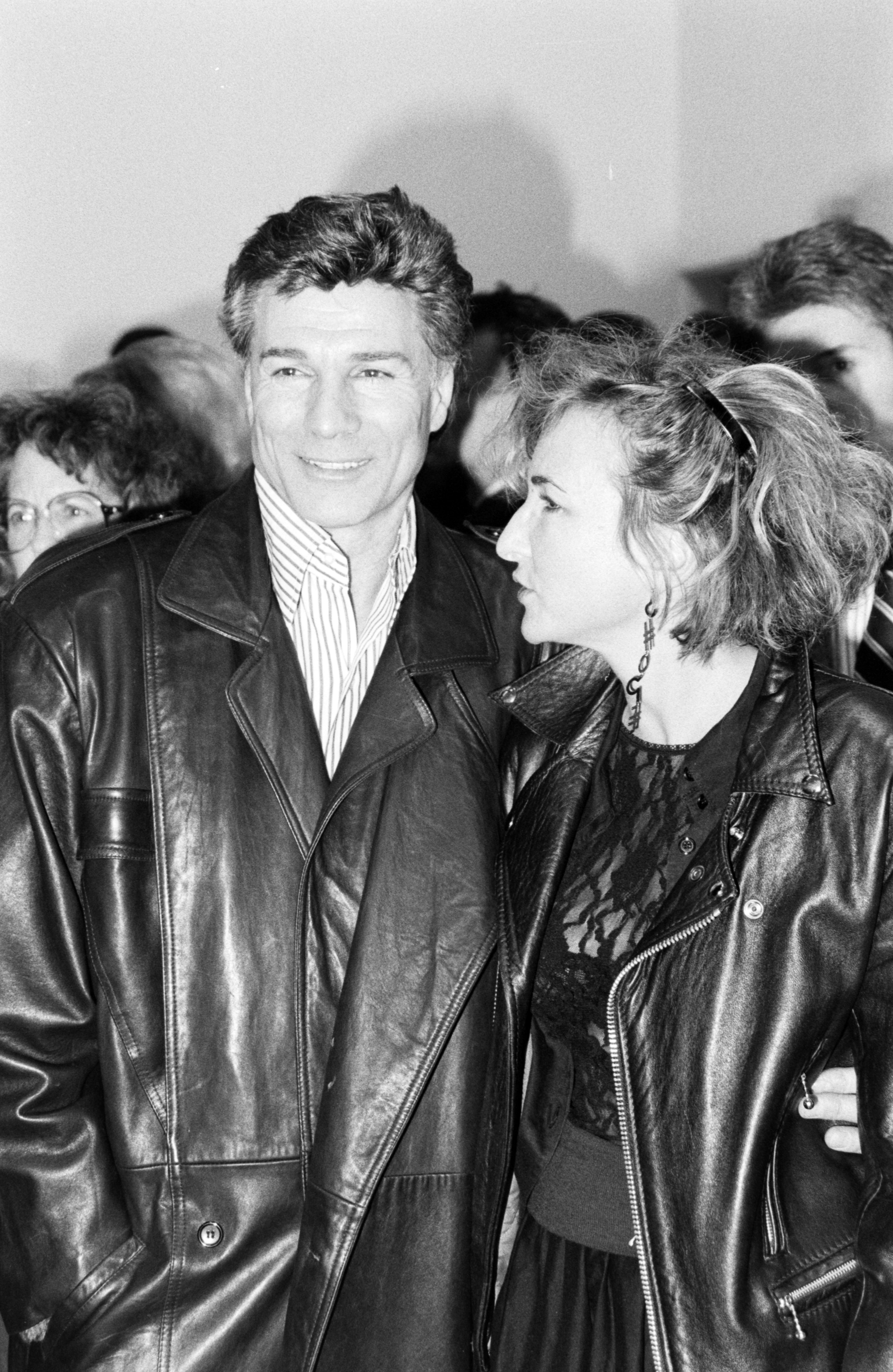 George Maharis with a date in Los Angeles in 1988 | Source: Getty Images