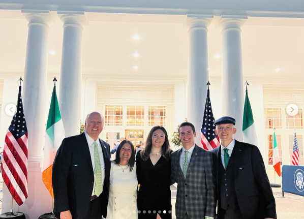 Joe, Kasey Nilson, Kenzie, Liam, and Cullen Crowley posing for a group photo, dated May 2025 | Source: Instagram/joecrowley