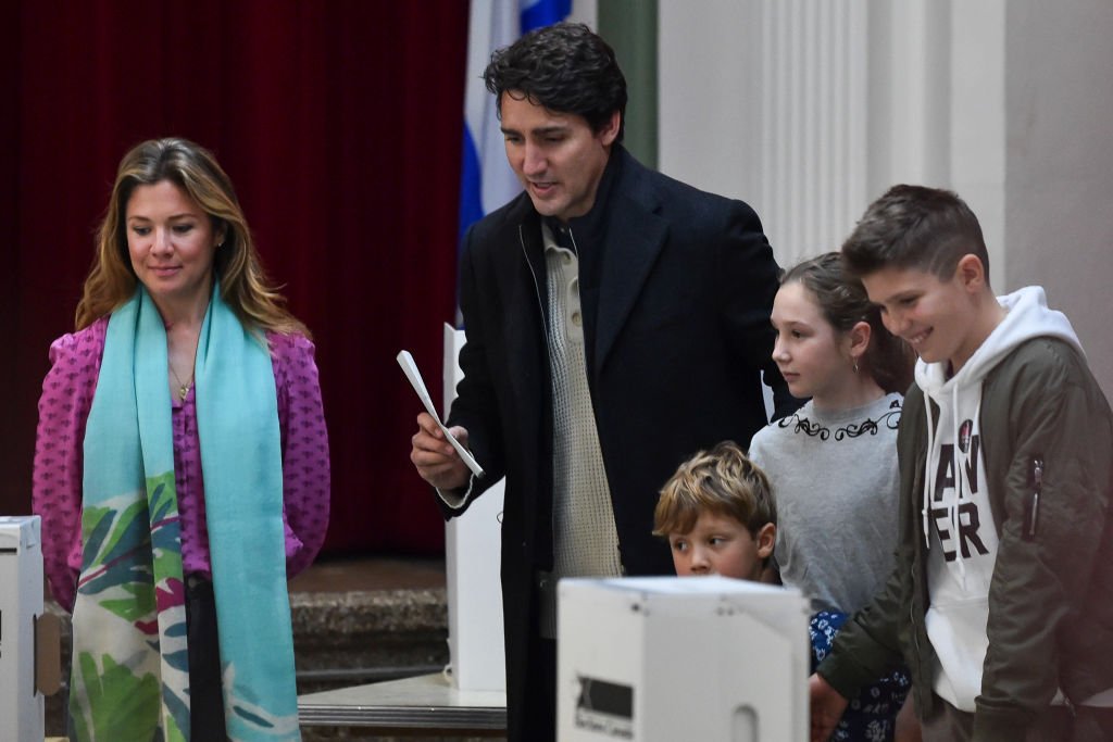 Canadian Prime Minister Justin Trudeau is accompanied by his wife Sophie Gregoire and his children in advance of casting his ballot on election day on October 21, 2019 in Montreal, Canada | Photo: Getty Images