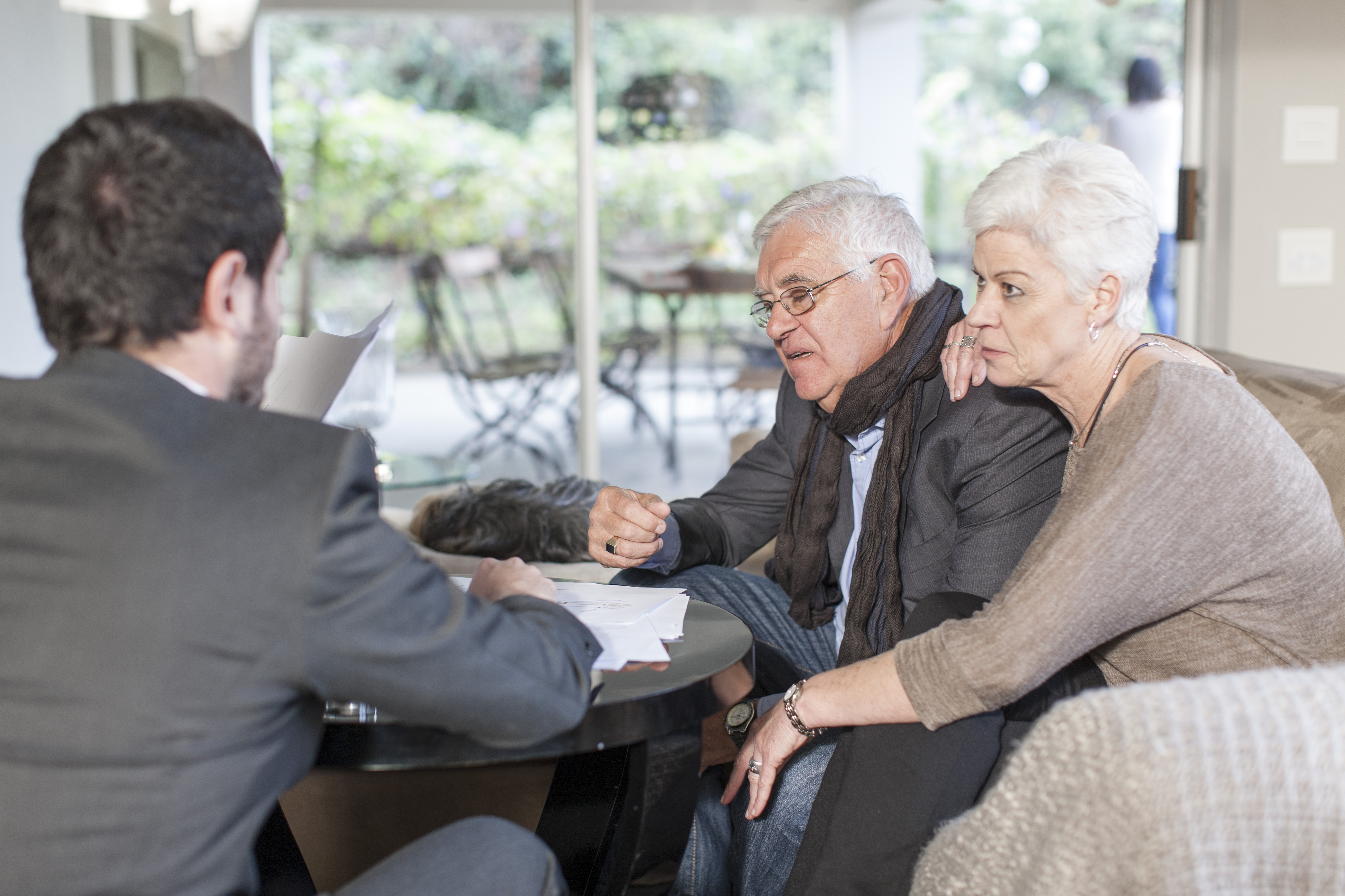 A young man fighting with an old couple | Source: Getty Images