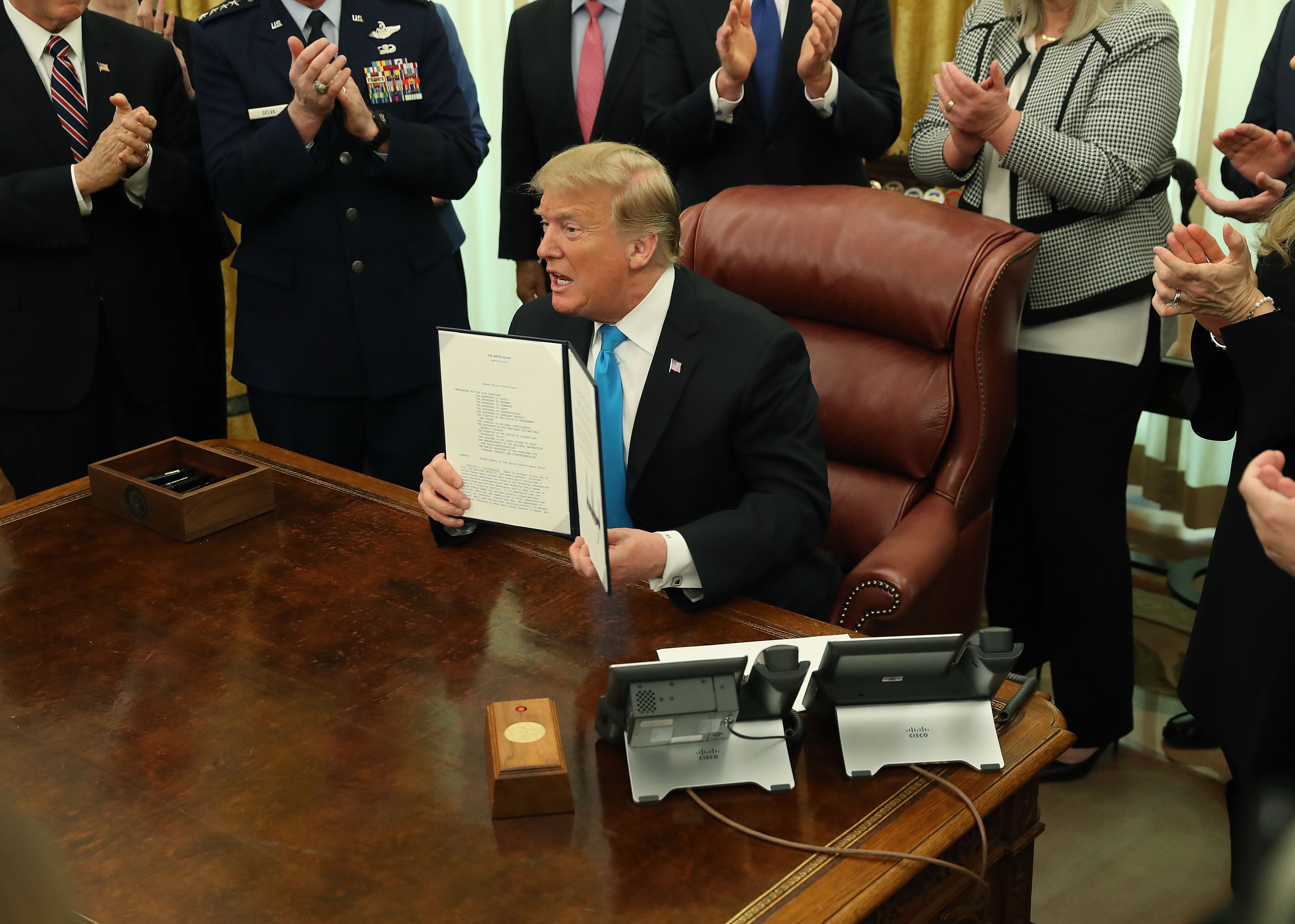 President Donald Trumpafter signing the Space Policy Directive 4 at the Oval Office | Photo: Getty Images