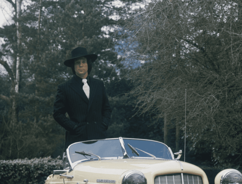 Pictured: An undated image of "The Voice" judge Tom Jones posing in his car | Photo: Getty Images