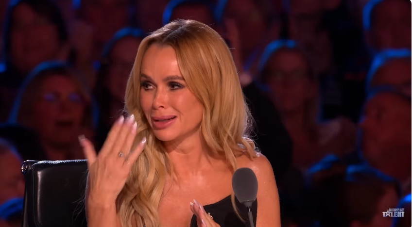 Amanda Holden appears visibly moved as she reacts to Joan's stirring performance from the judges' panel. | Source: YouTube/Britain's Got Talent