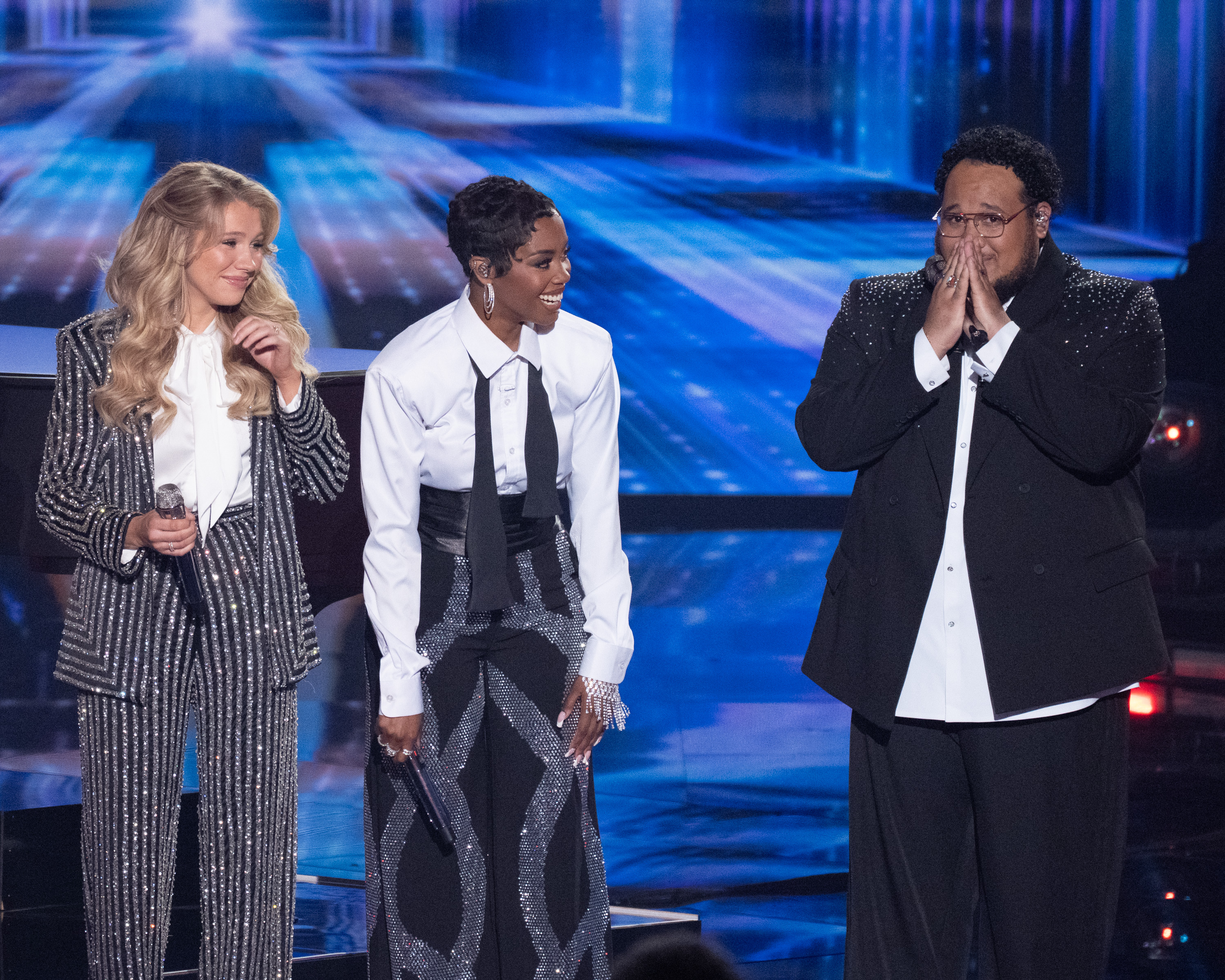 Hannah Harper, Keyla Richardson, and Jordan McCullough react onstage during the "American Idol" Season 24 grand finale. | Source: Getty Images