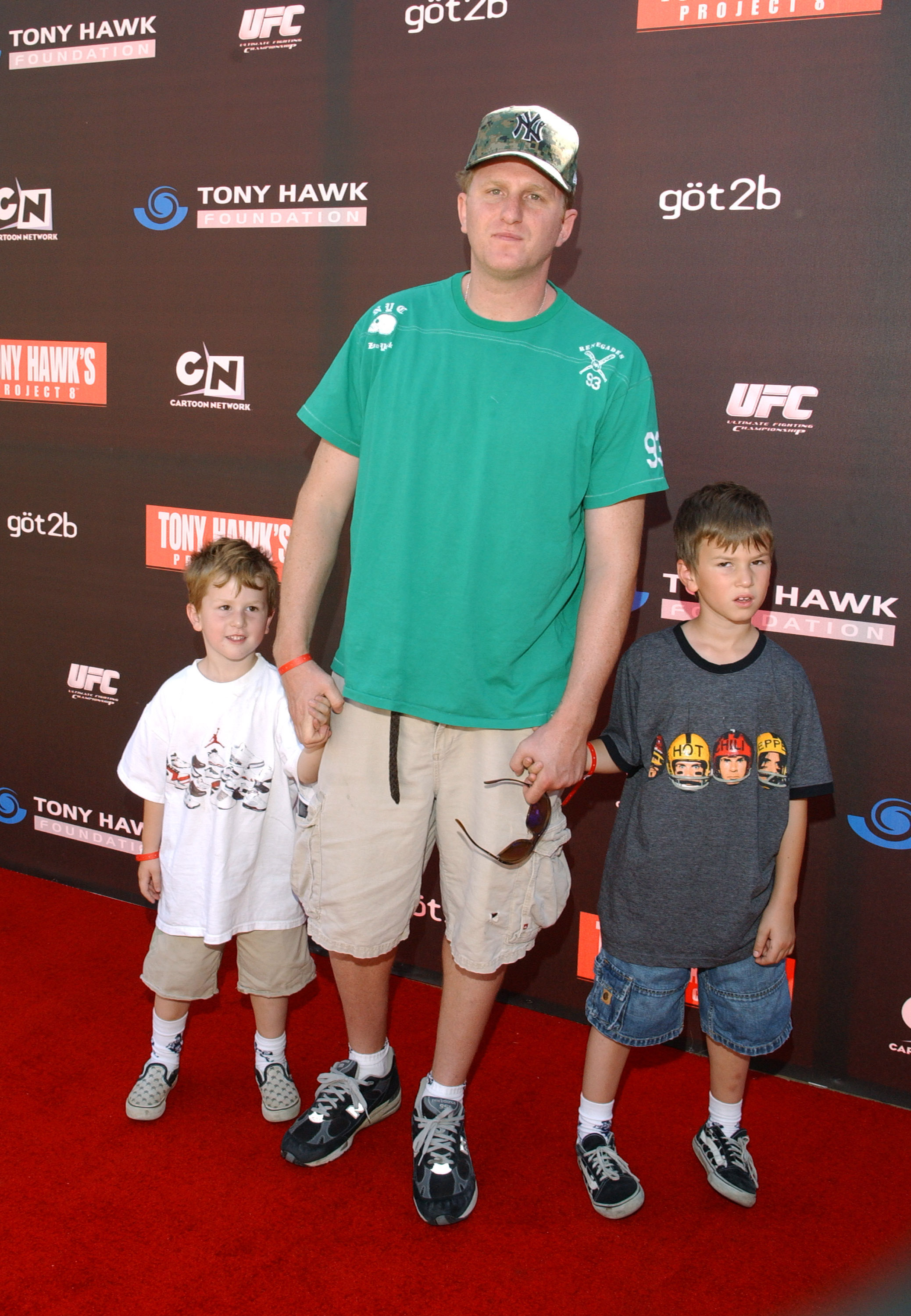 Michael Rapaport and sons, Maceo and Julian, are pictured during Tony Hawk's Project 8 Stand Up for Skateparks at Green Acres Estate on an unspecified date in Beverly Hills, California | Source: Getty Images
