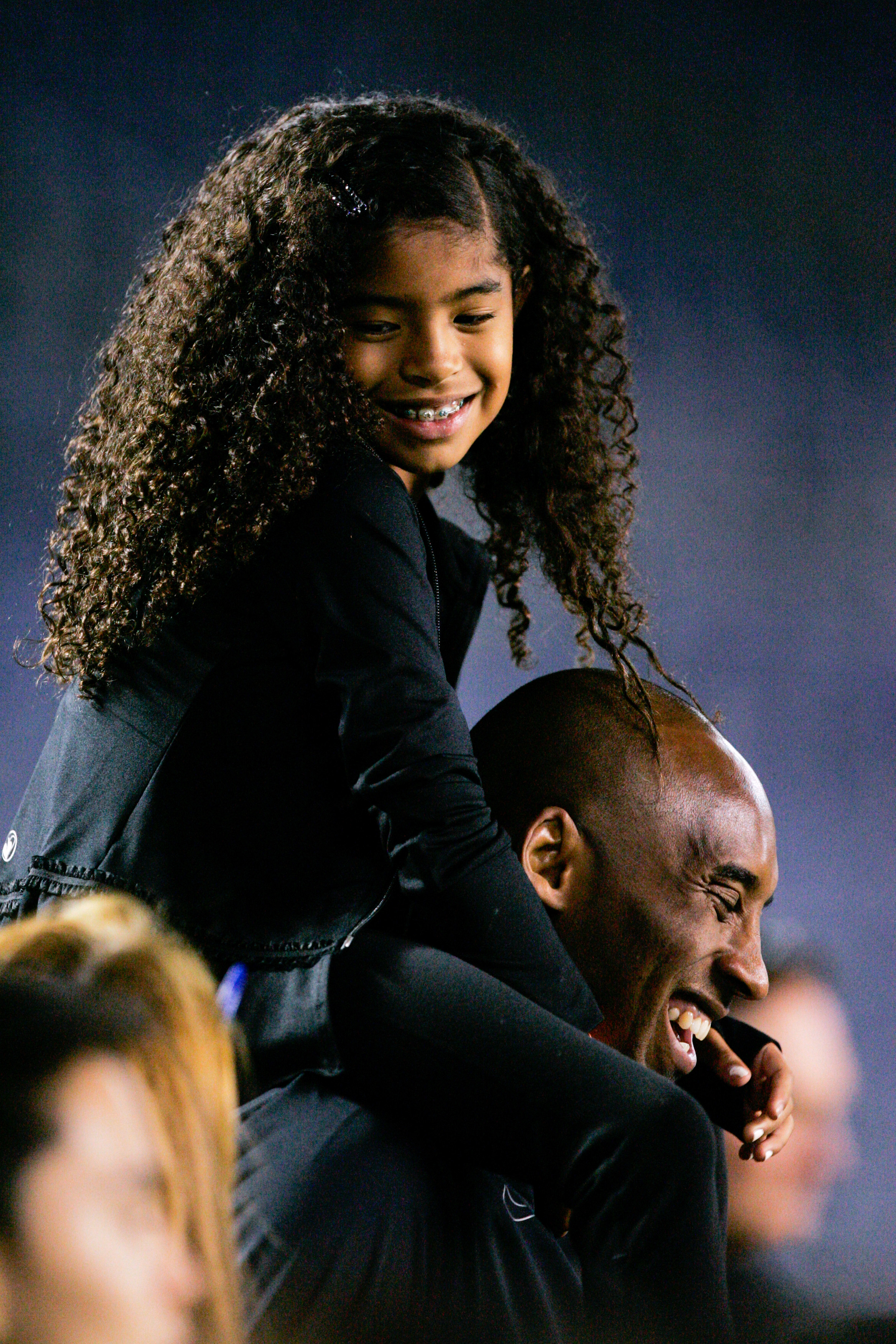 Kobe and Gianna Bryant on the sideline ahead of a game between the United States and China during an international friendly match at Qualcomm Stadium on April 10, 2014, in San Diego, California. | Source: Getty Images