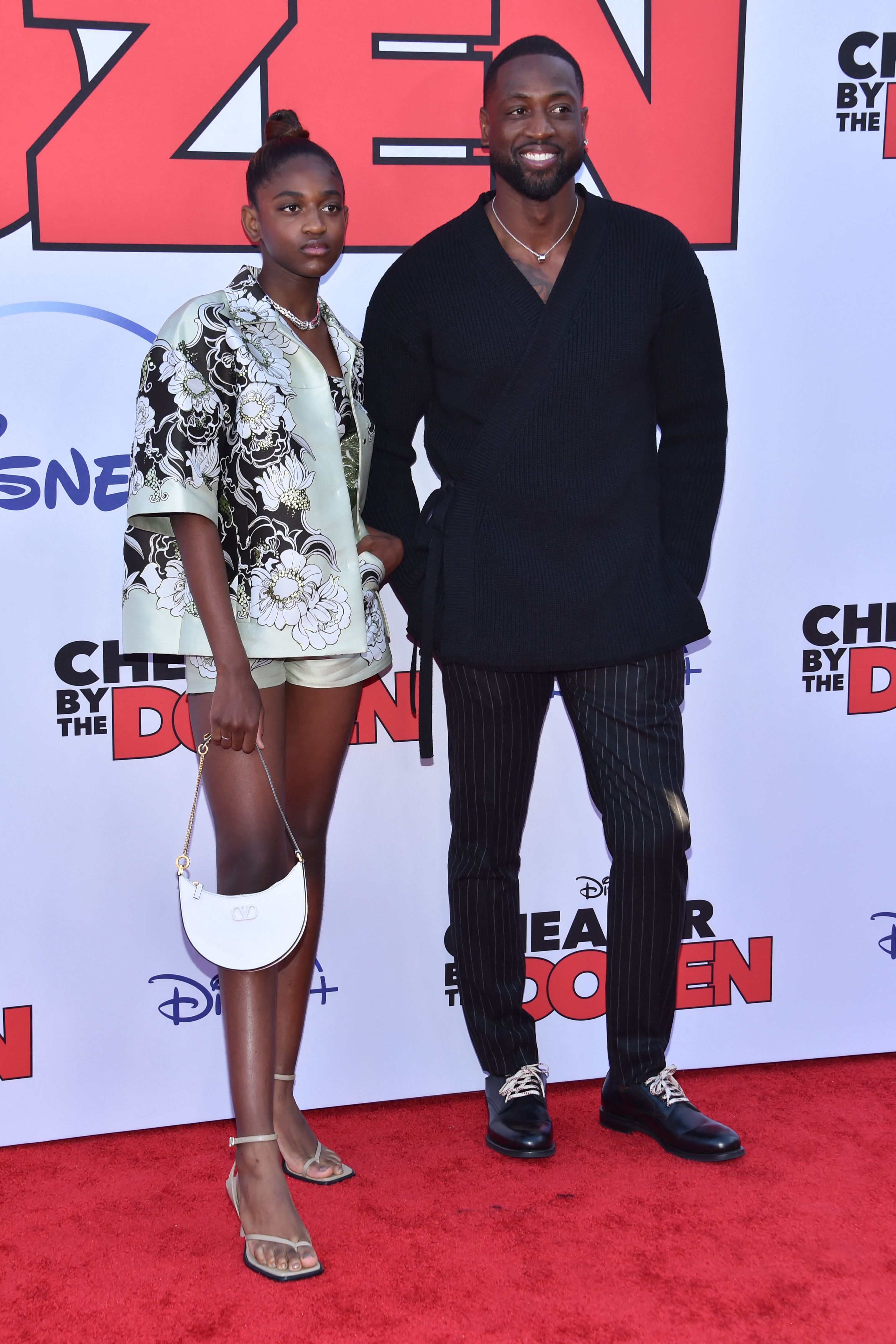 Zaya and Dwyane Wade at the Disney premiere of "Cheaper by the Dozen" in Hollywood, California on March 16, 2022 | Source: Getty Images