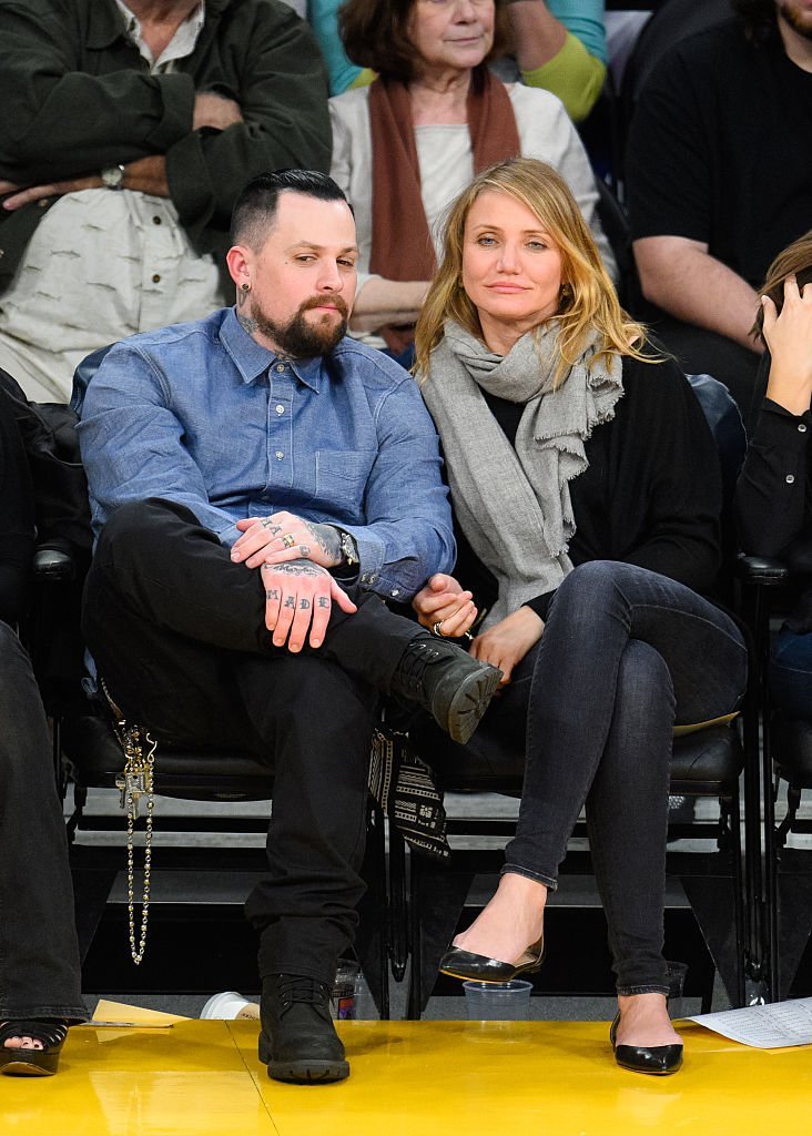 Benji Madden (L) and Cameron Diaz attend a basketball game between the Washington Wizards and the Los Angeles Lakers at Staples Center. | Photo: Getty Images
