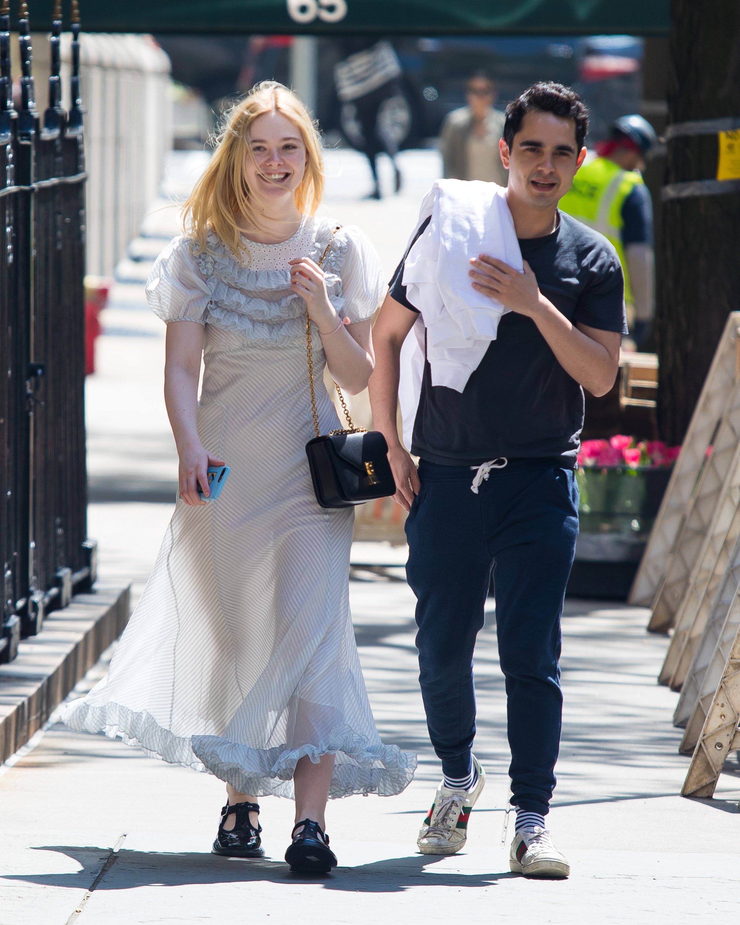 Elle Fanning and Max Minghella taking a stroll on May 2, 2019, in New York | Source: Getty Images