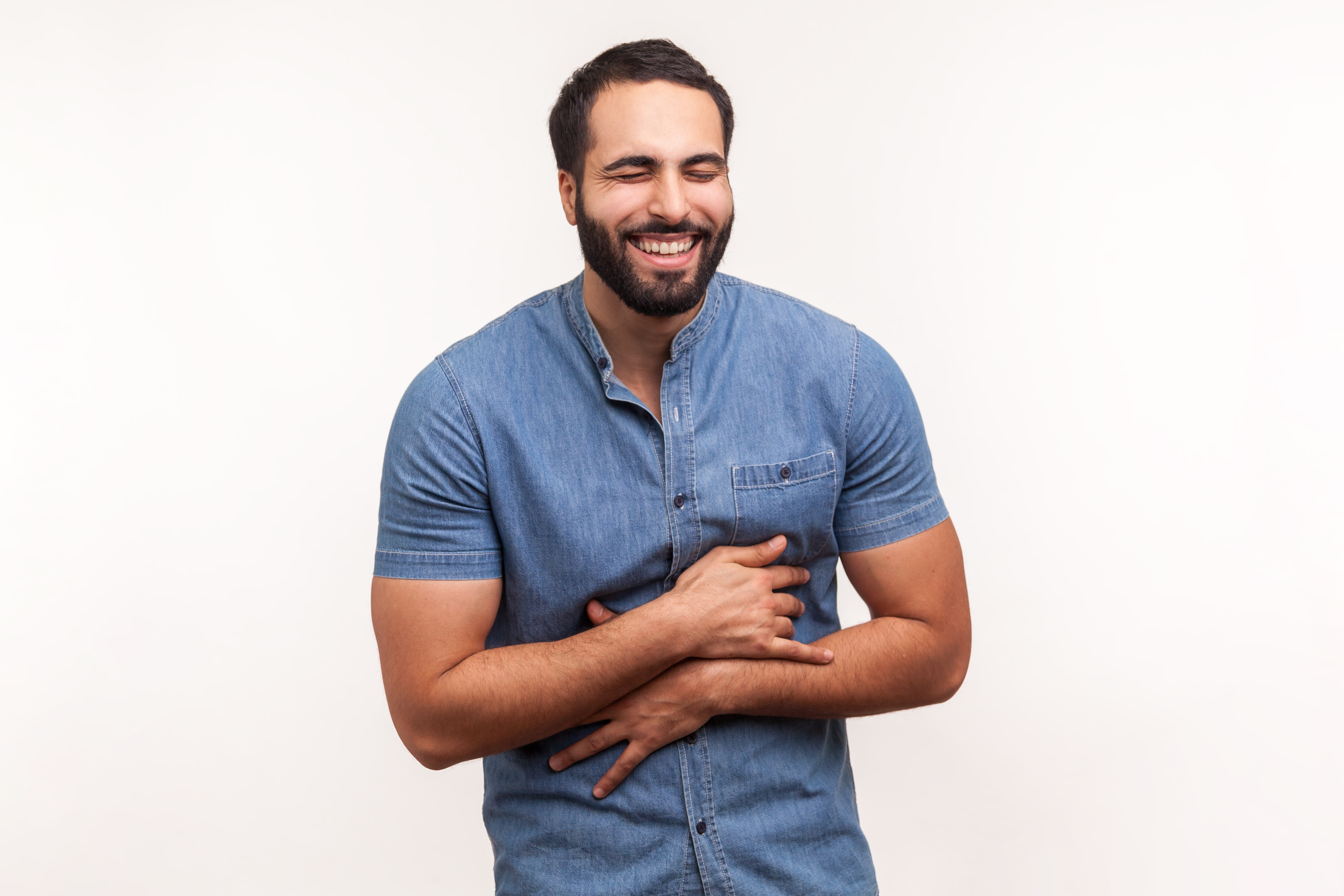 A man laughing | Source: Shutterstock