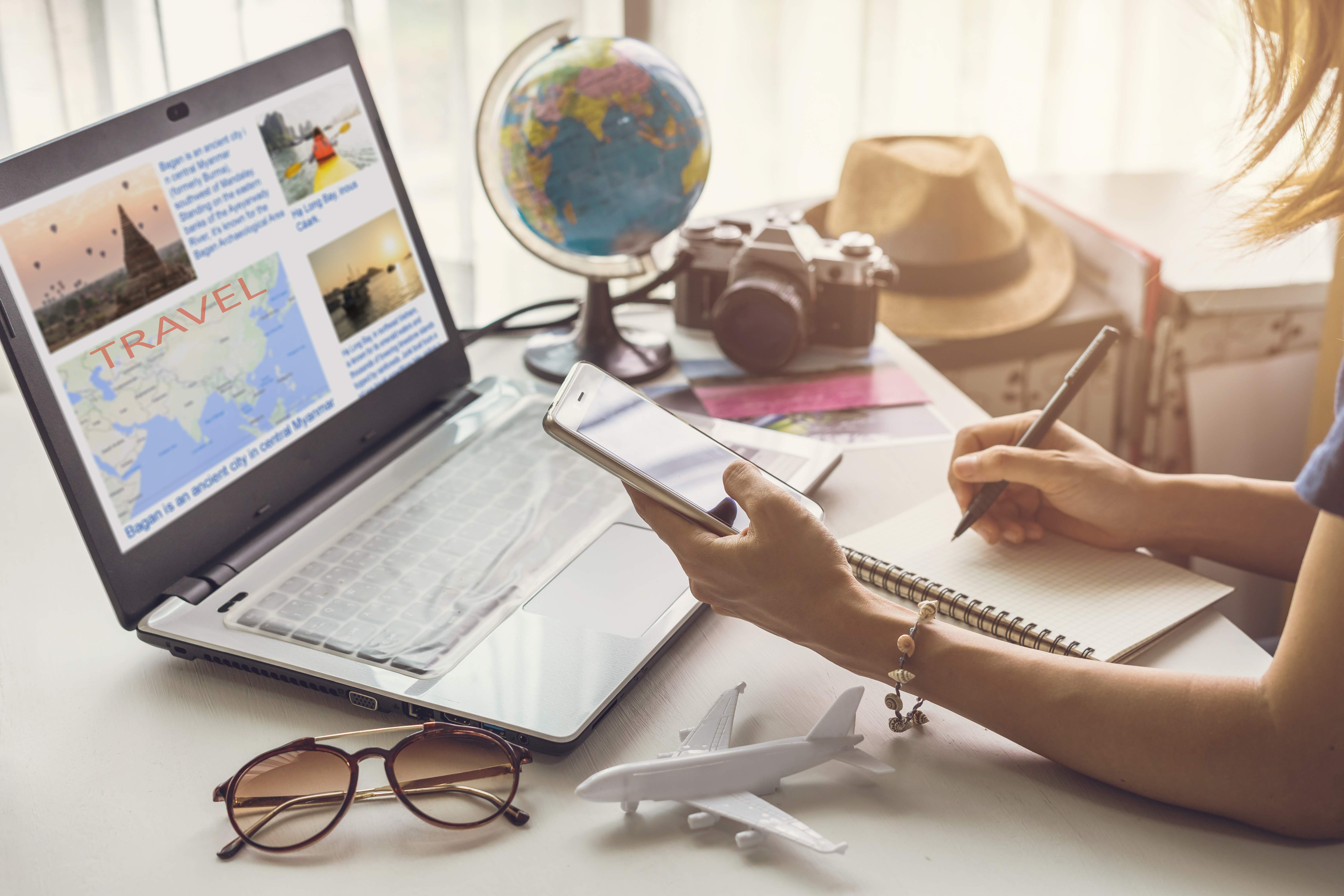 A woman planning a trip | Source: Shutterstock