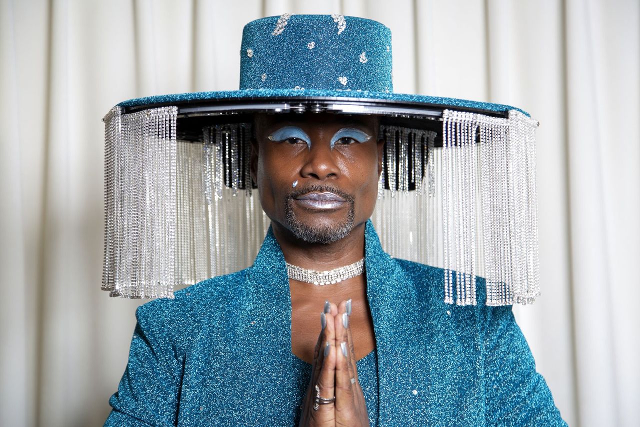 Billy Porter gets ready for The 62nd Annual GRAMMY Awards styled by Sam Ratelle, wearing BAJA EAST and custom hat by Sarah Sokol Millinery in Los Angeles, California | Photo: Getty Images