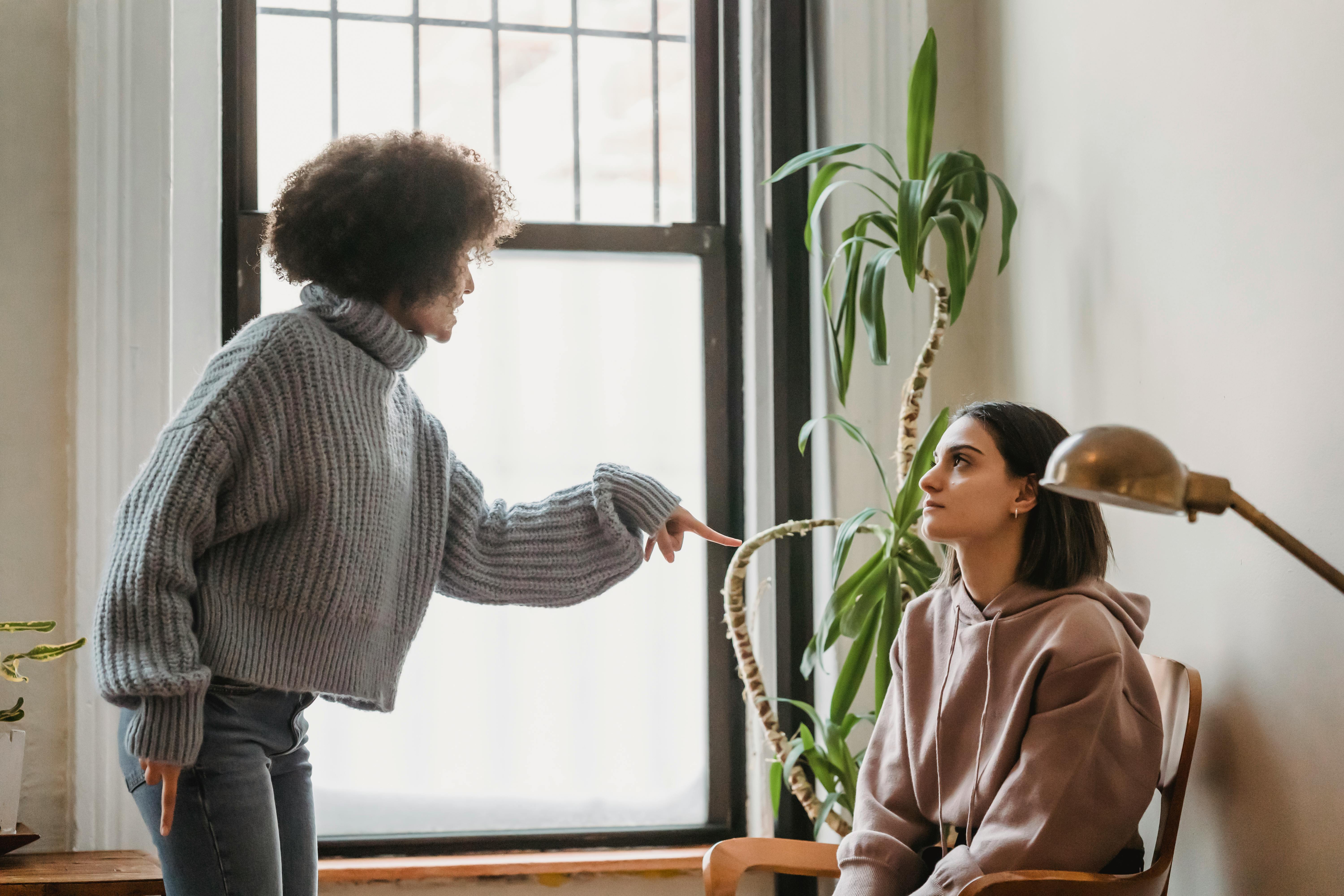 An angry woman shouting at another woman | Source: Pexels